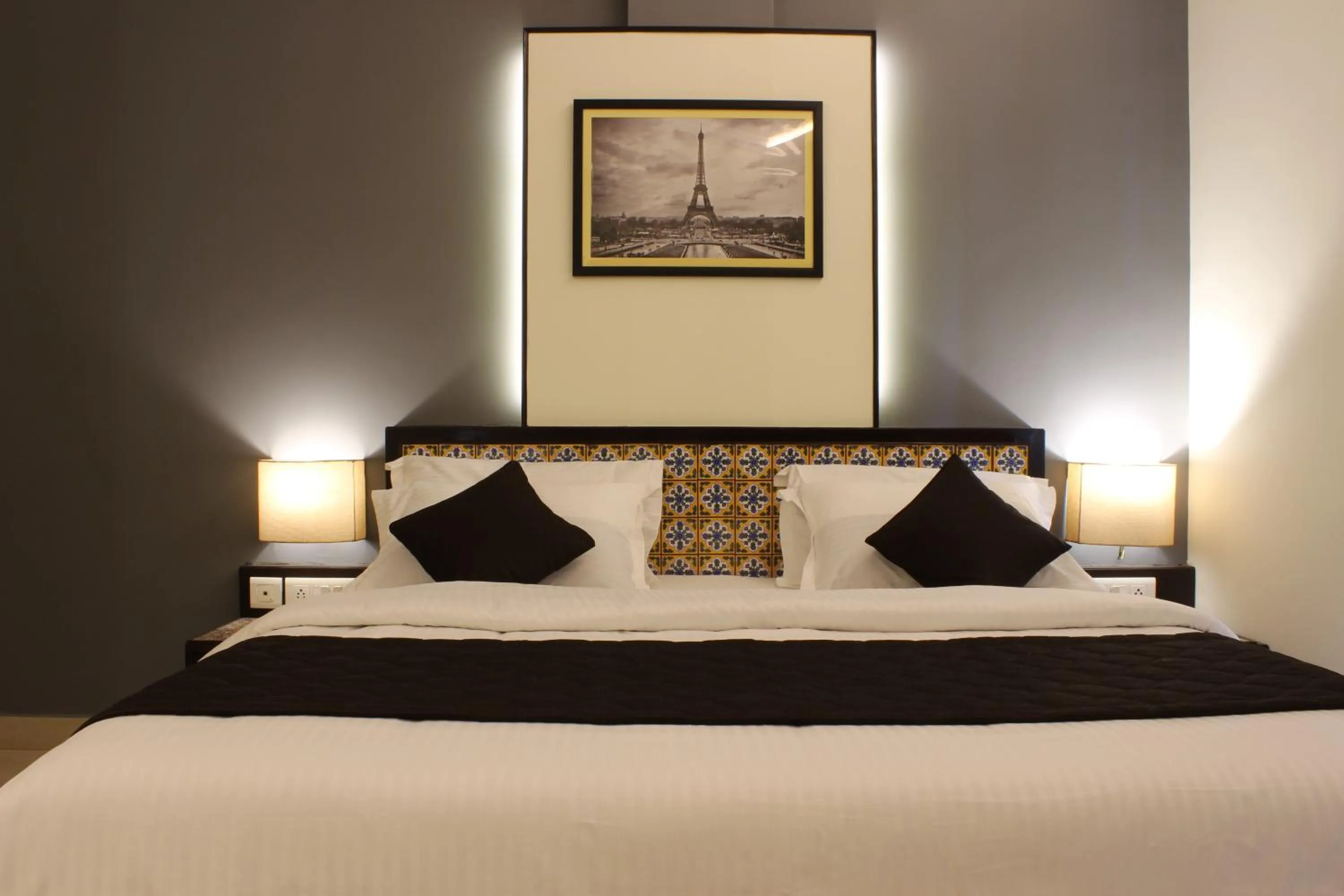 Bed in Ria Residency