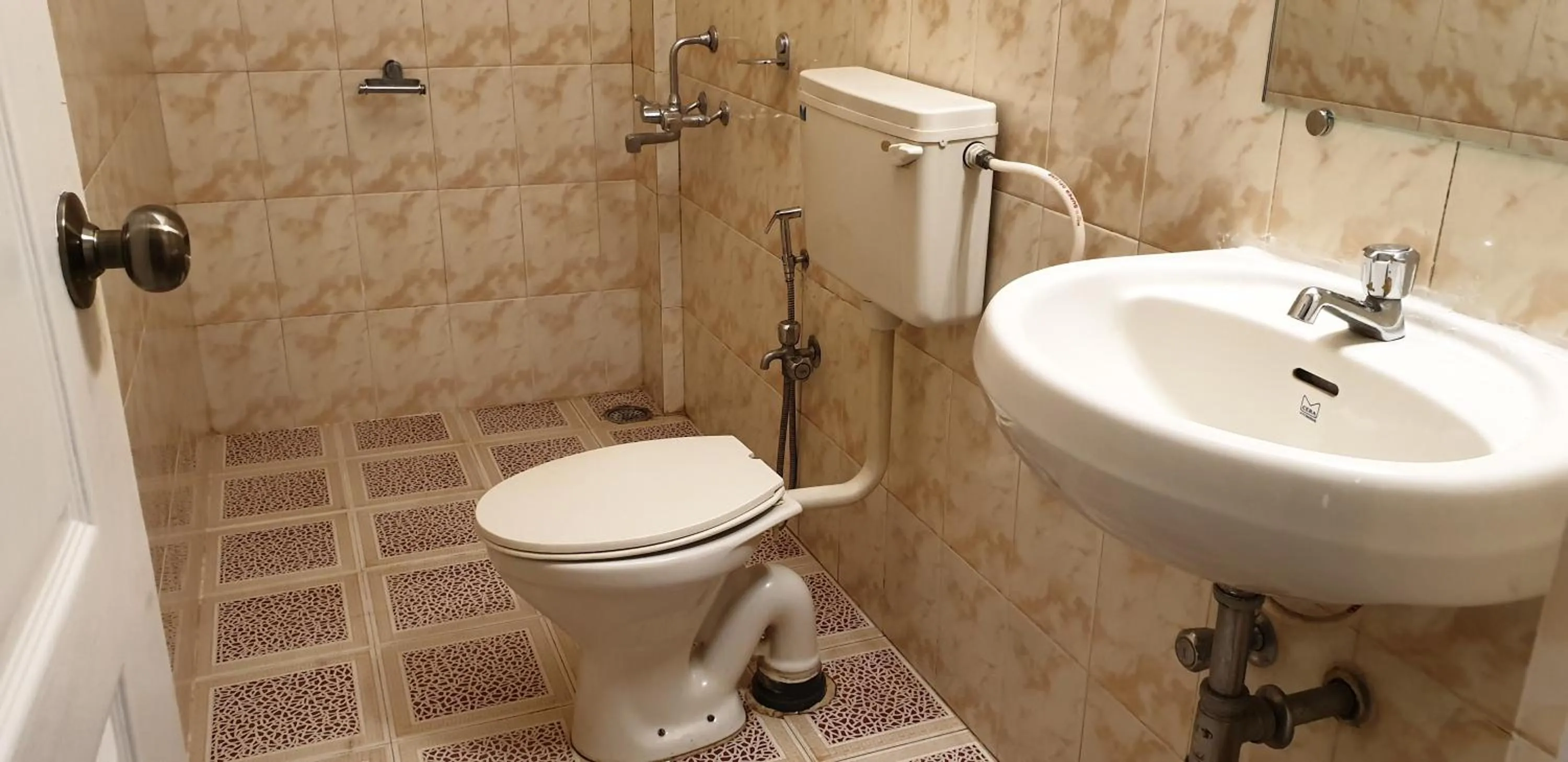 Bathroom in Ria Residency