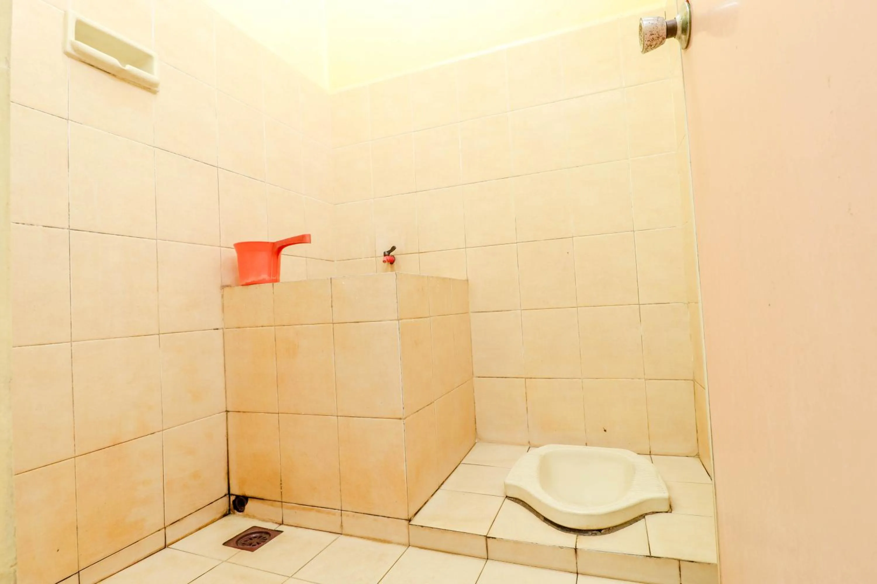 Bathroom in Primadona Homestay