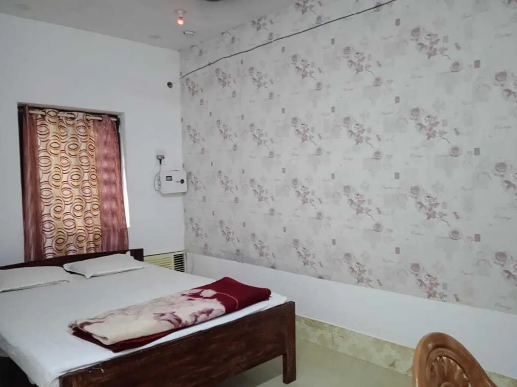 Bedroom in Hotel O Aashna