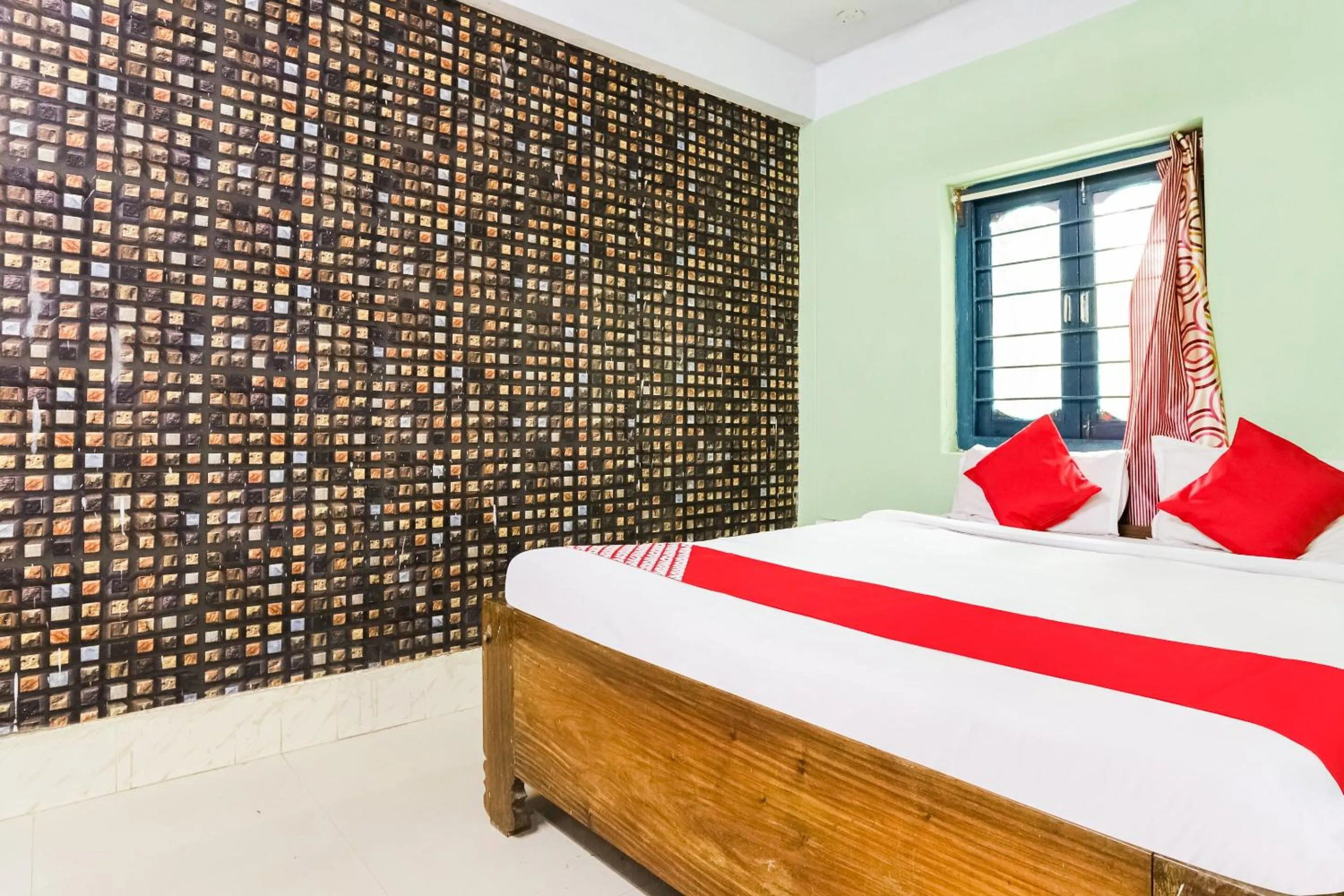 Bedroom in Hotel O Aashna