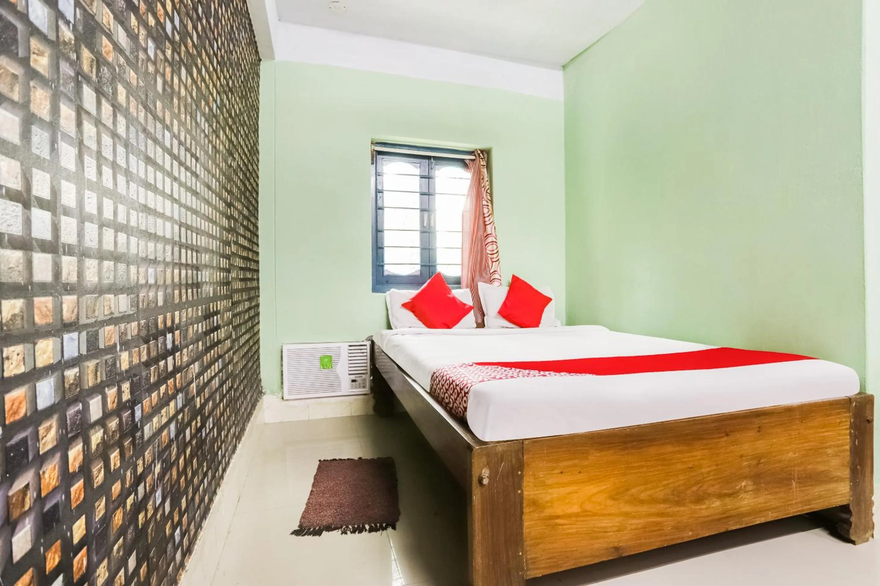 Bedroom in Hotel O Aashna