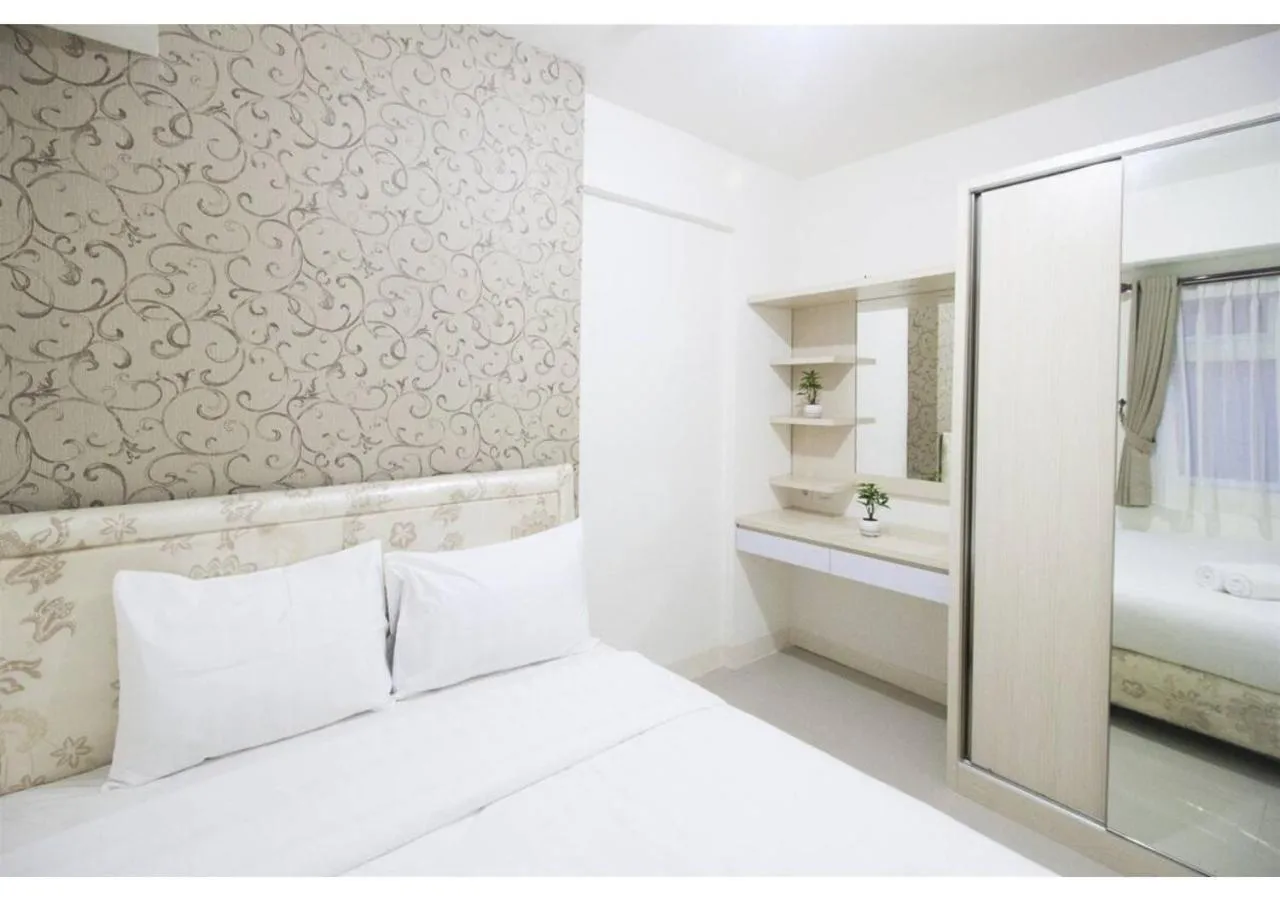 Bedroom in Apartment Green Pramuka by Vincent