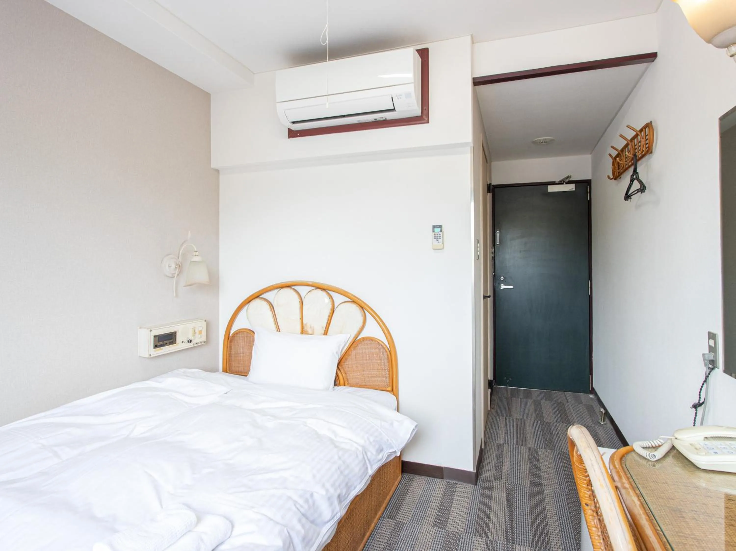 Photo of the whole room, Bed in Tabist New World Hotel Kagoshima Kanoya