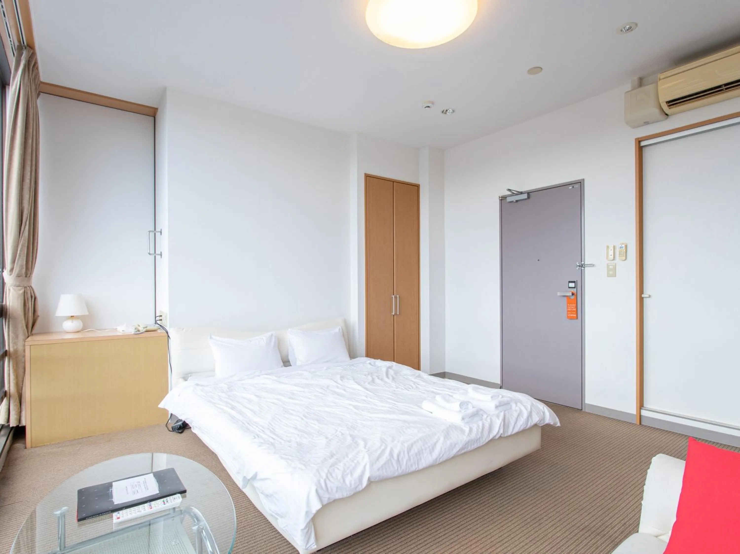 Photo of the whole room, Bed in Tabist New World Hotel Kagoshima Kanoya