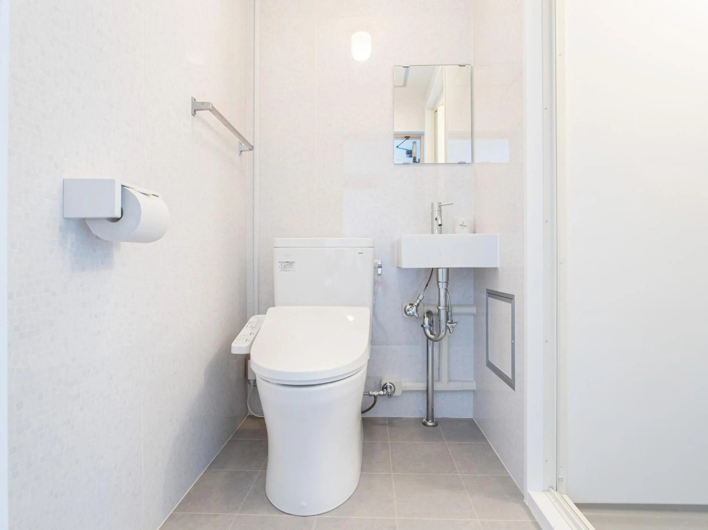 Toilet in Tabist New World Hotel Kagoshima Kanoya