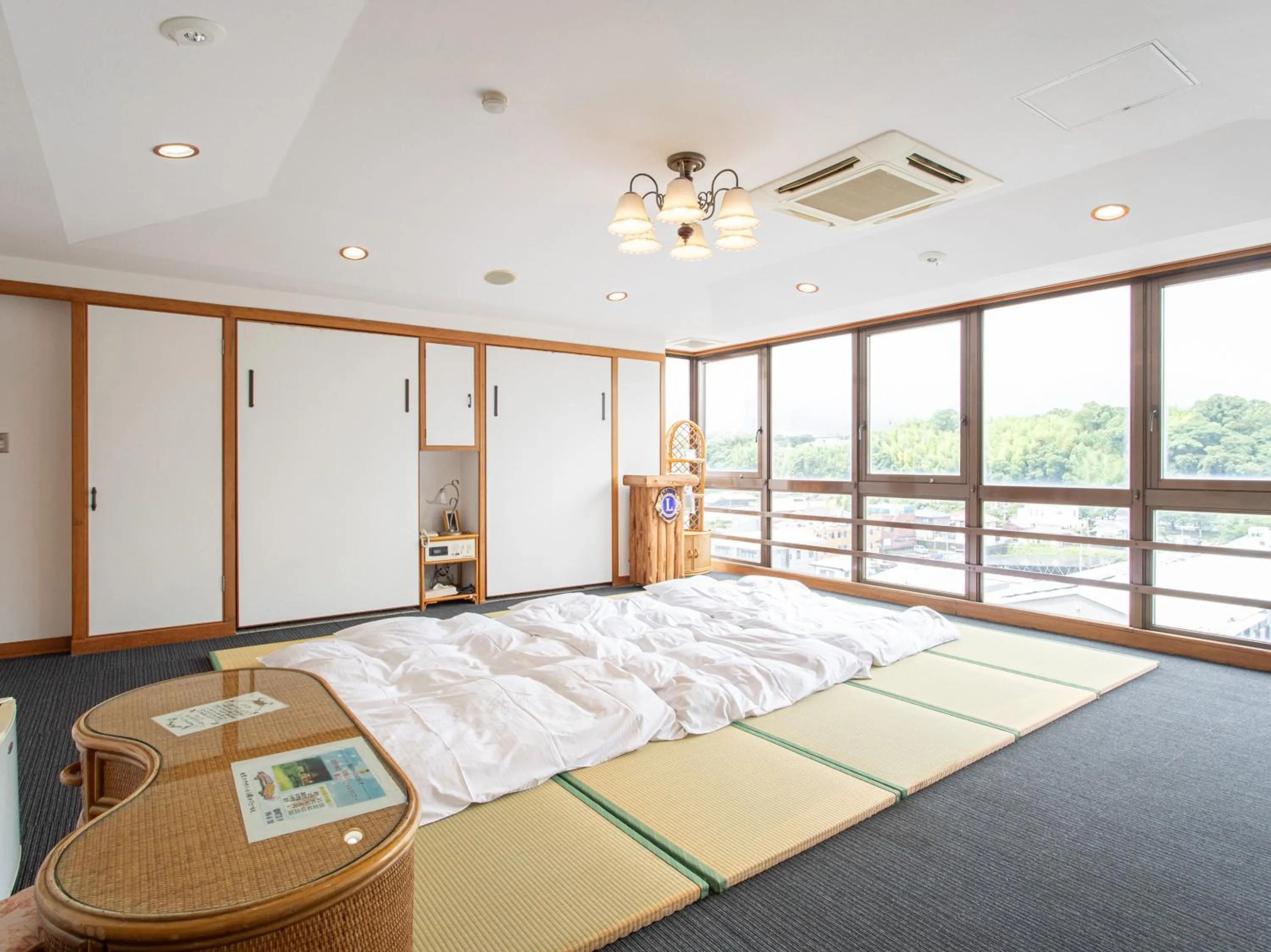 Photo of the whole room, Bed in Tabist New World Hotel Kagoshima Kanoya