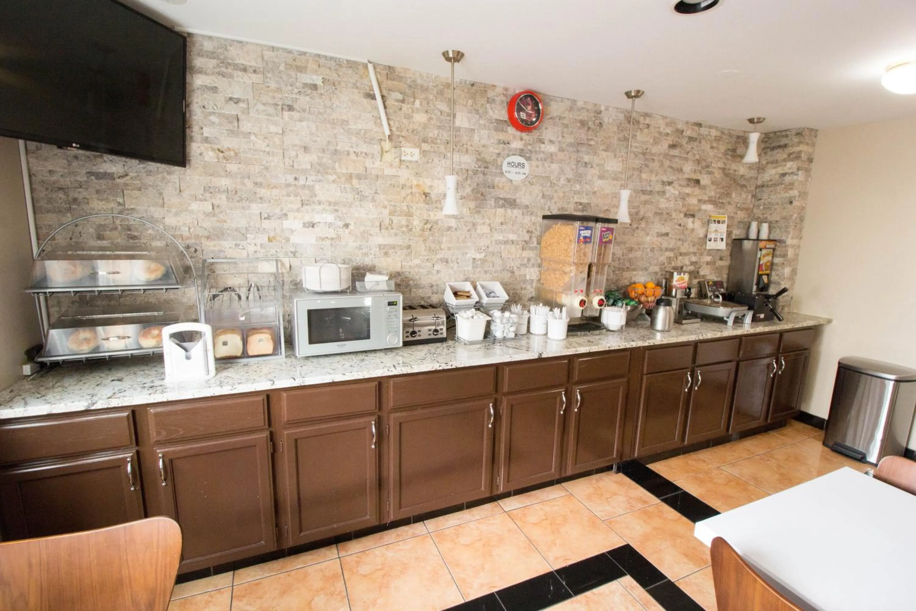 Buffet breakfast in Super 8 by Wyndham Chicago O'Hare Airport