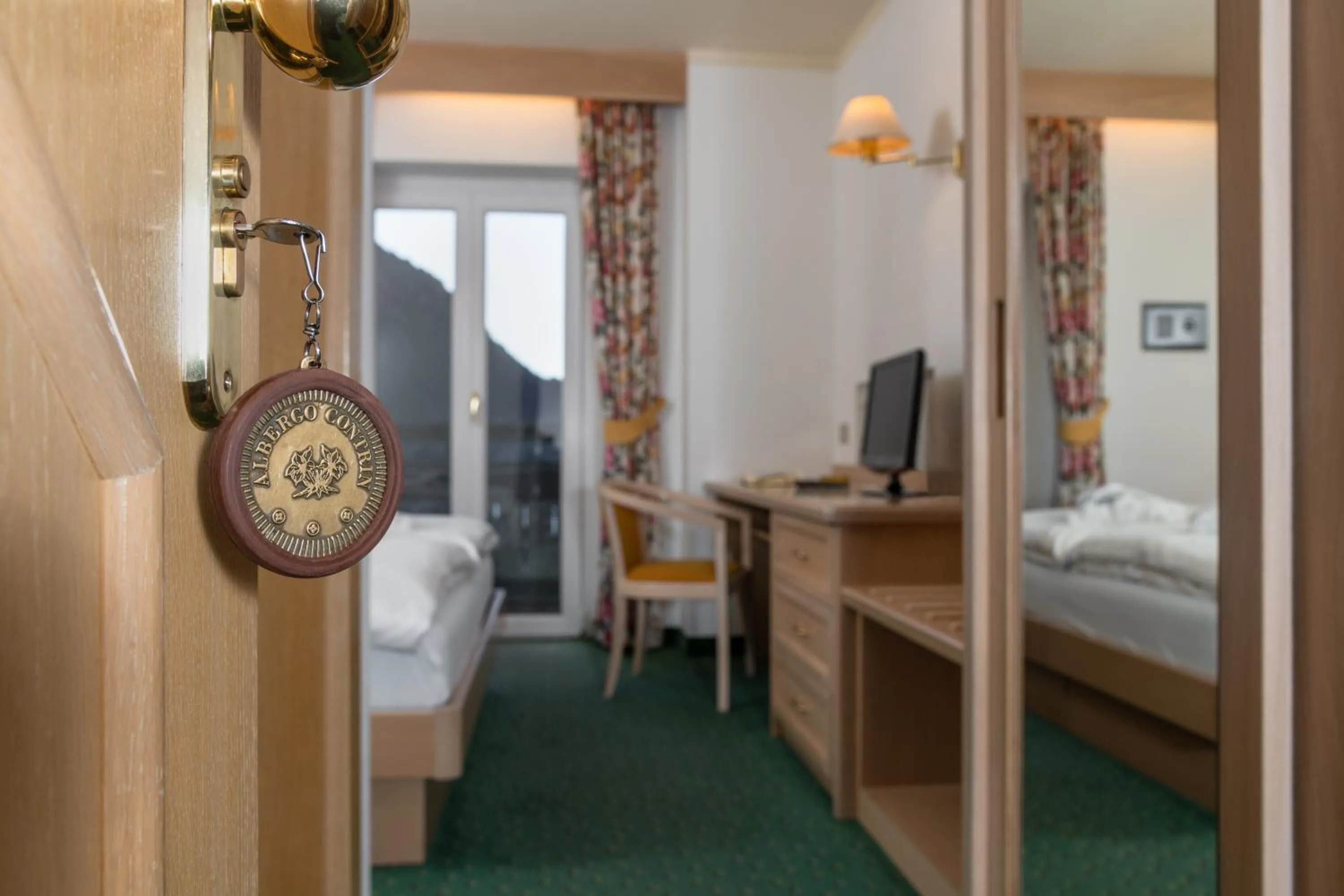 Bed in Albergo Contrin