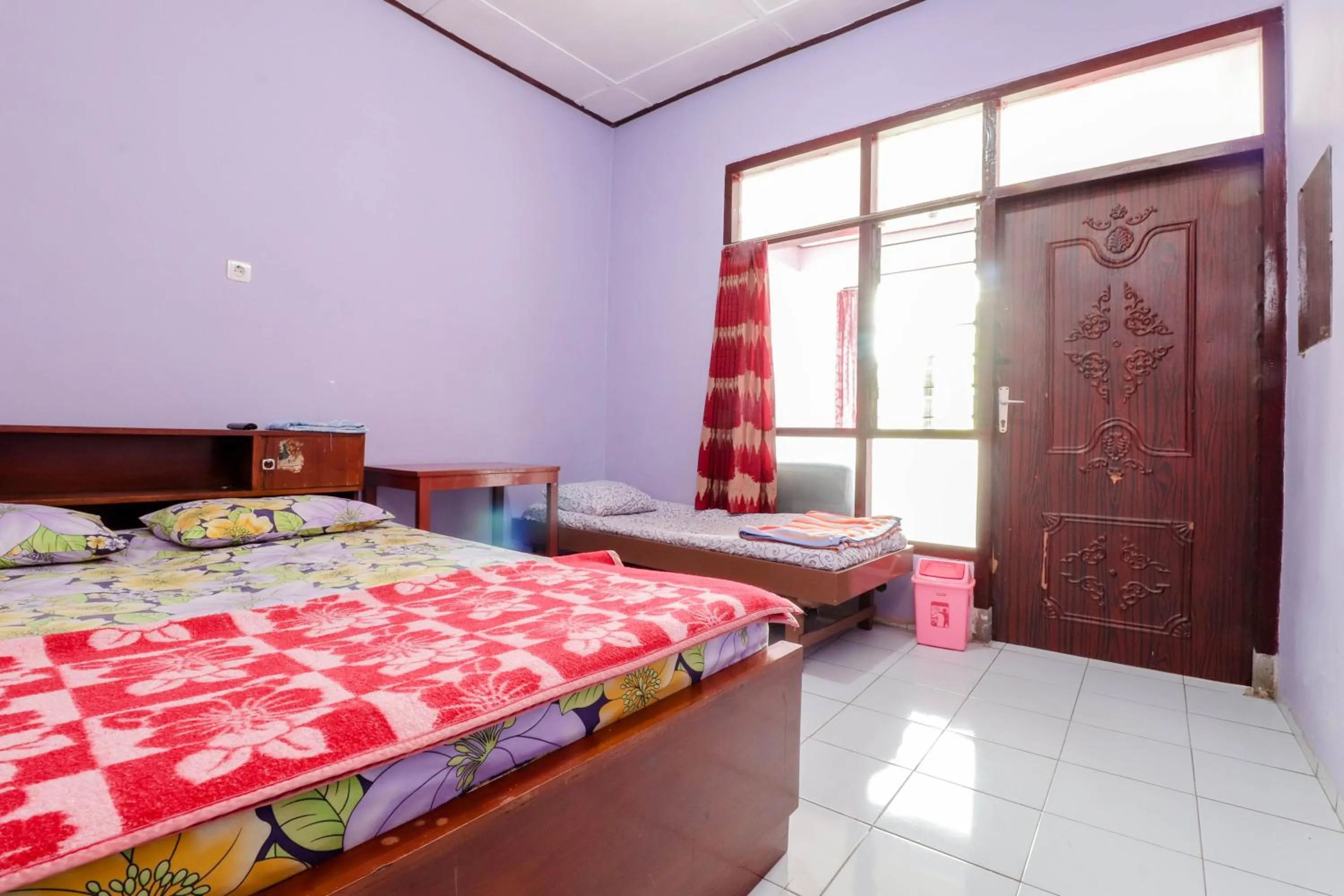 Bed in Penginapan Sedyo Rahayu