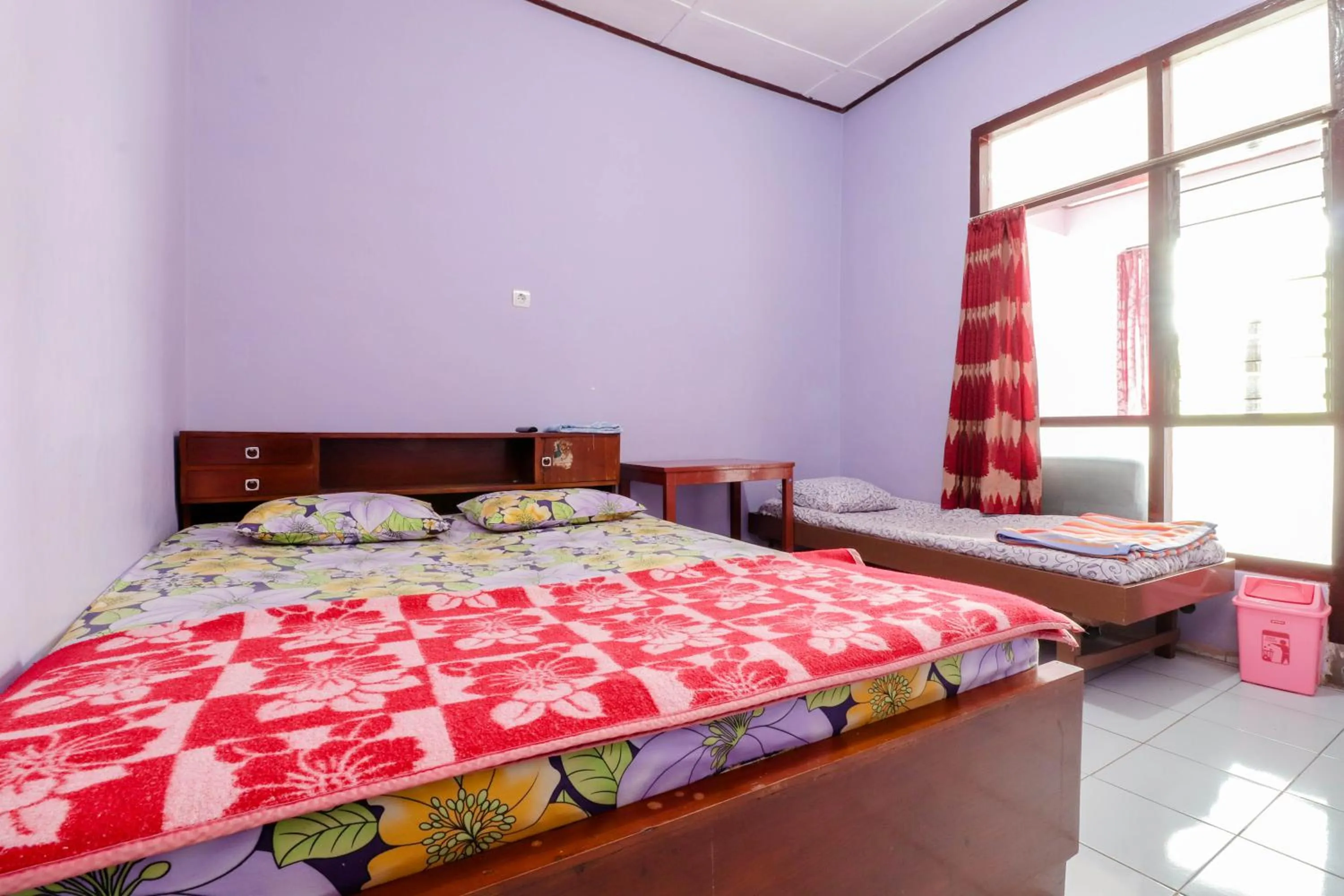 Bed in Penginapan Sedyo Rahayu