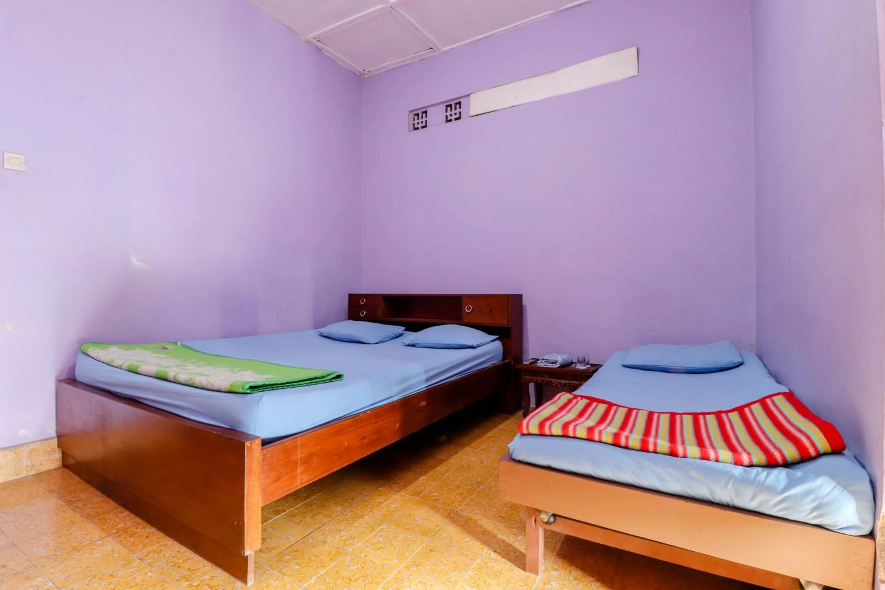 Bed in Penginapan Sedyo Rahayu