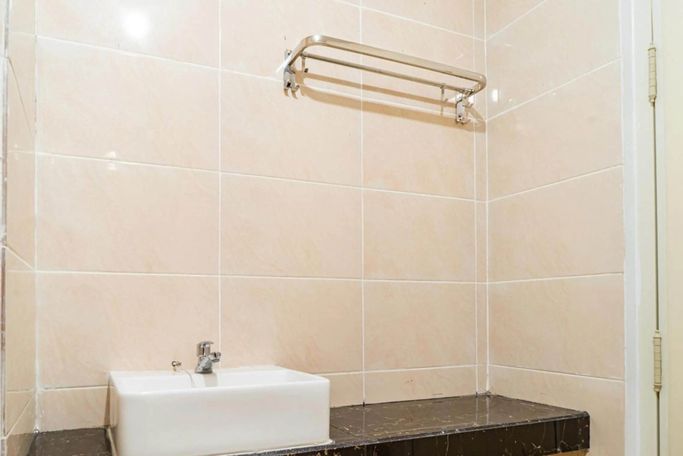 Bathroom in RedDoorz Plus near Teras Kota 3