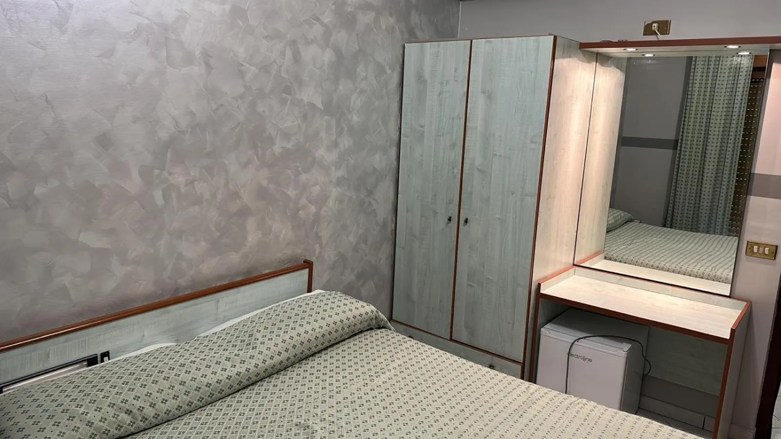 Bed in Hotel Paradiso