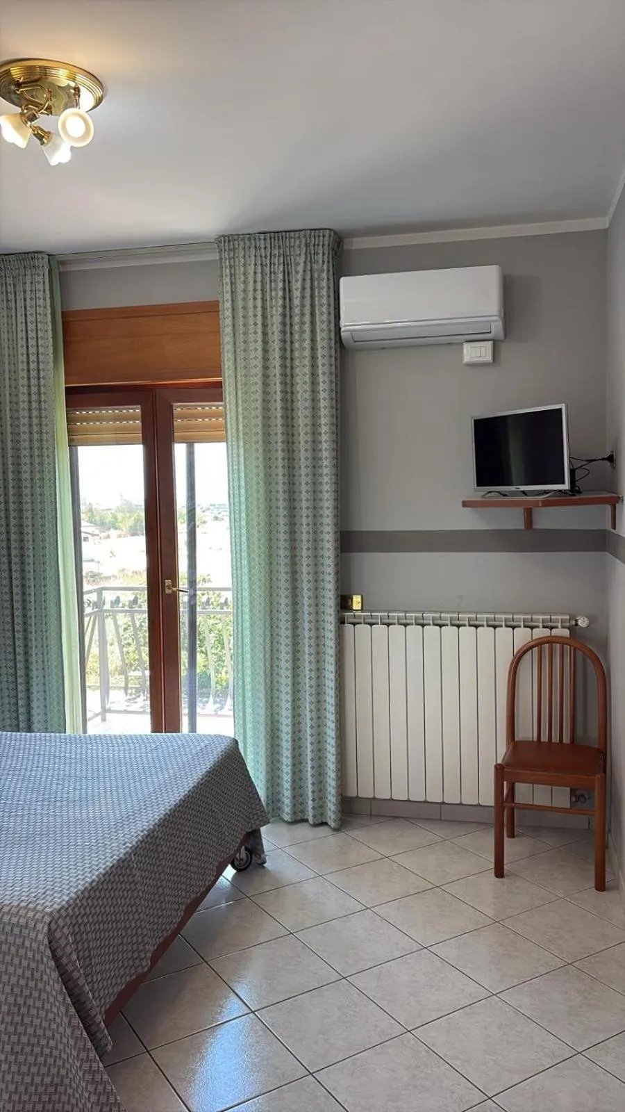 Bed in Hotel Paradiso