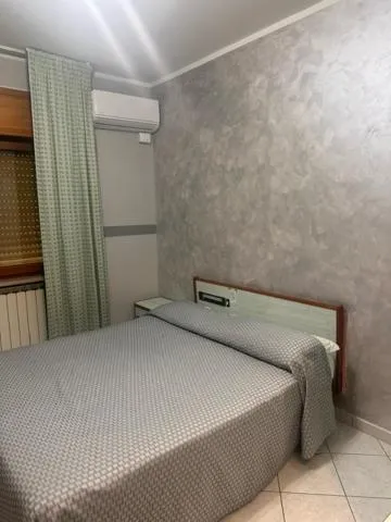 Bed in Hotel Paradiso