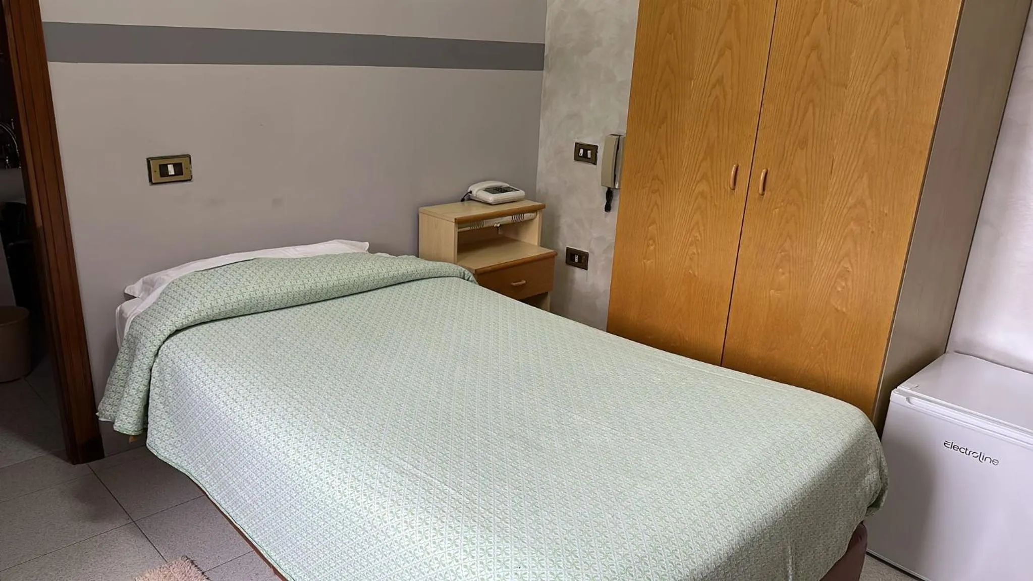 Bed in Hotel Paradiso