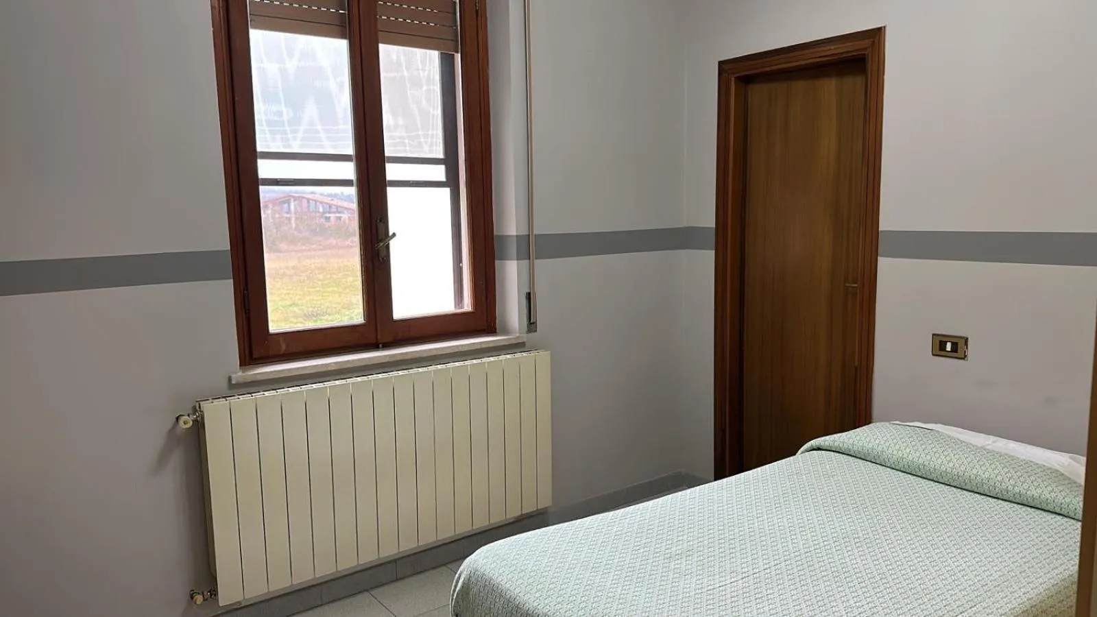 Bed in Hotel Paradiso