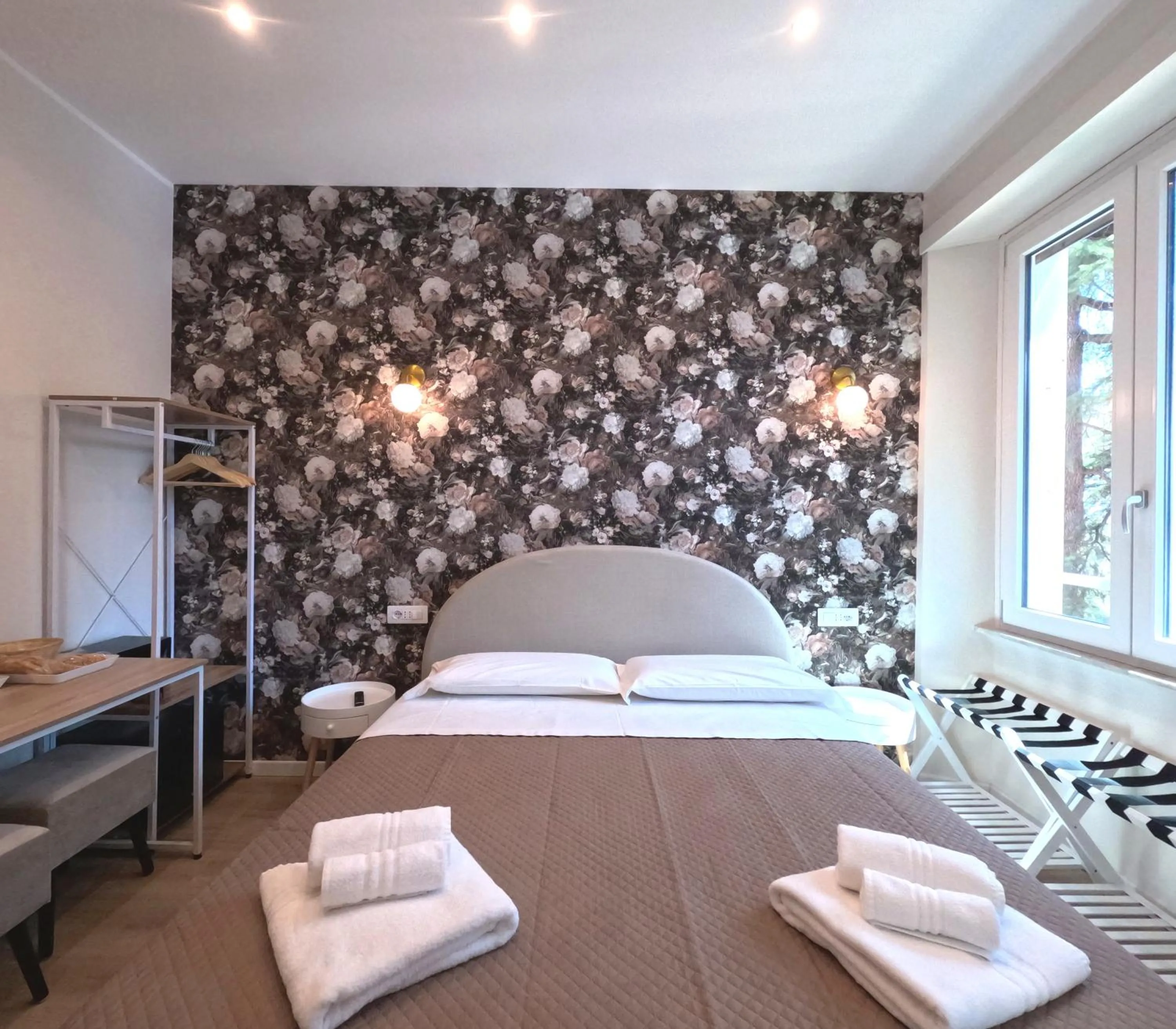 Bed in B&B Aurelia Garden Rooms