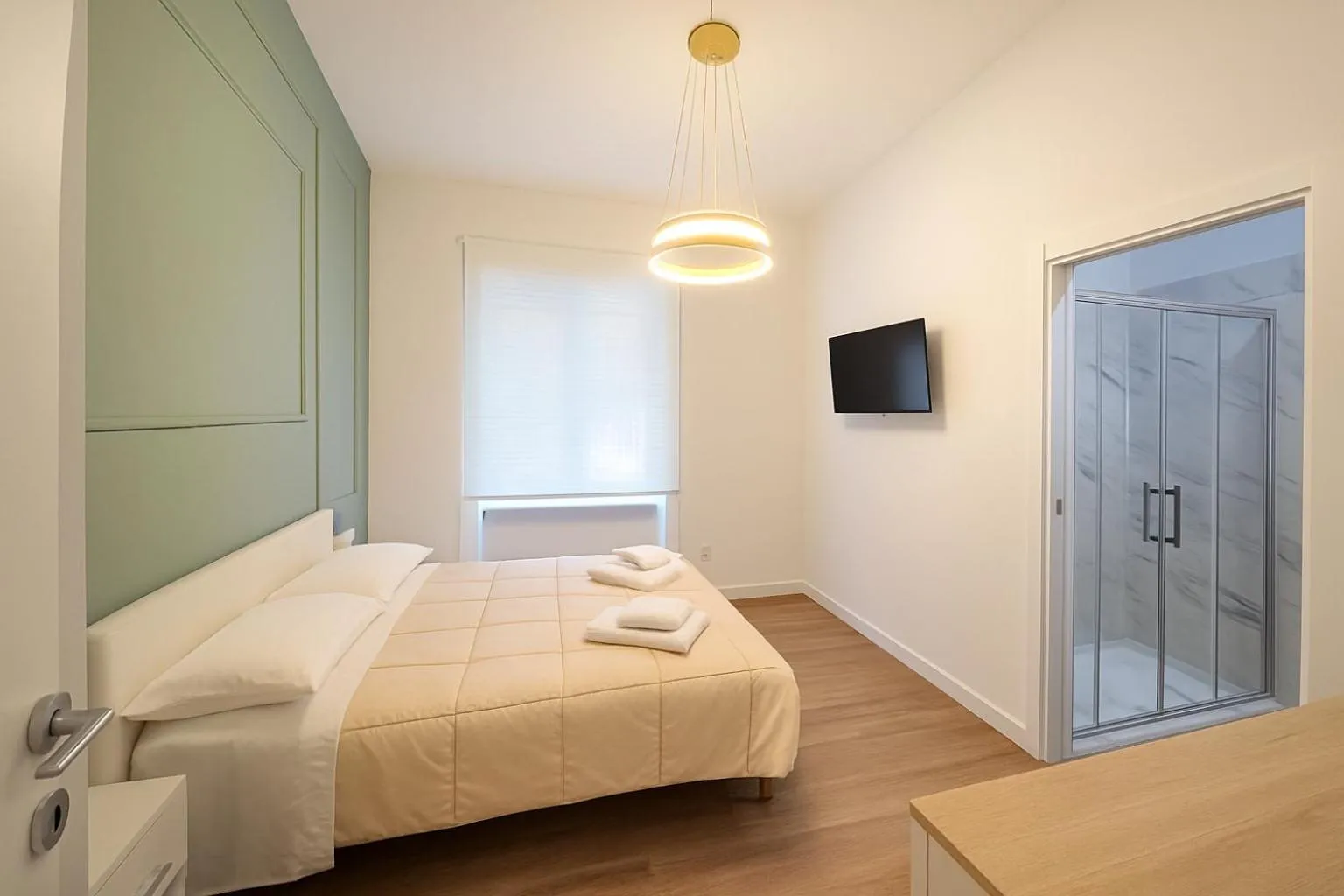 Bed in B&B Aurelia Garden Rooms