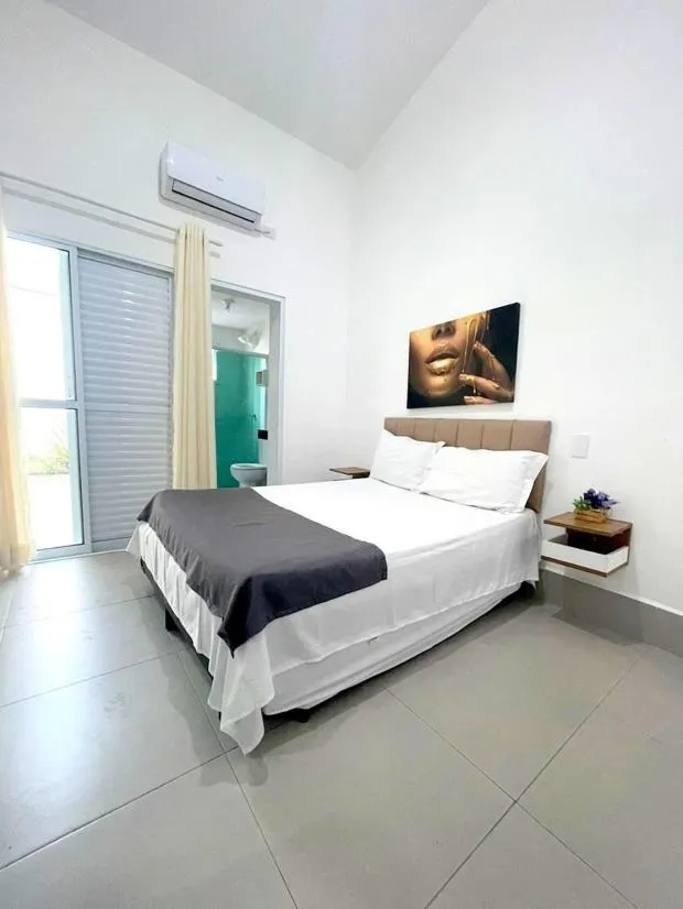 Bed in Pousada Village Cozumel