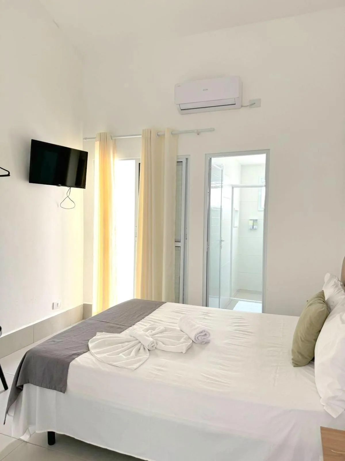 Bed in Pousada Village Cozumel