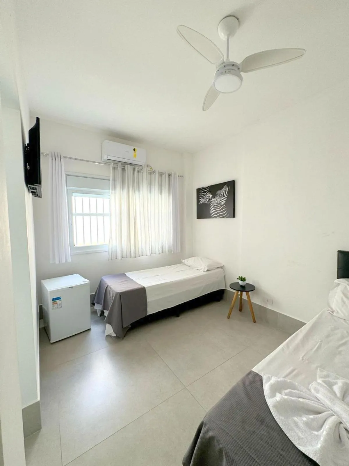 Bed in Pousada Village Cozumel