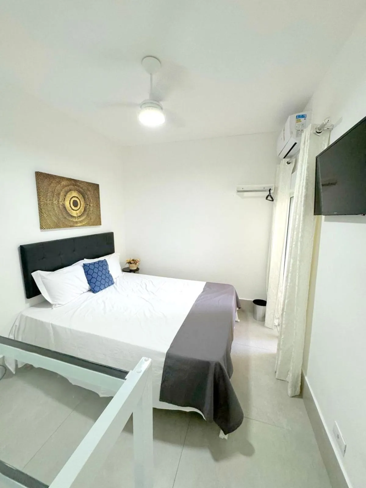 Bed in Pousada Village Cozumel