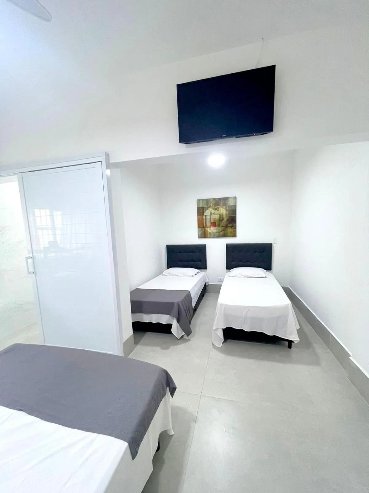 Bed in Pousada Village Cozumel