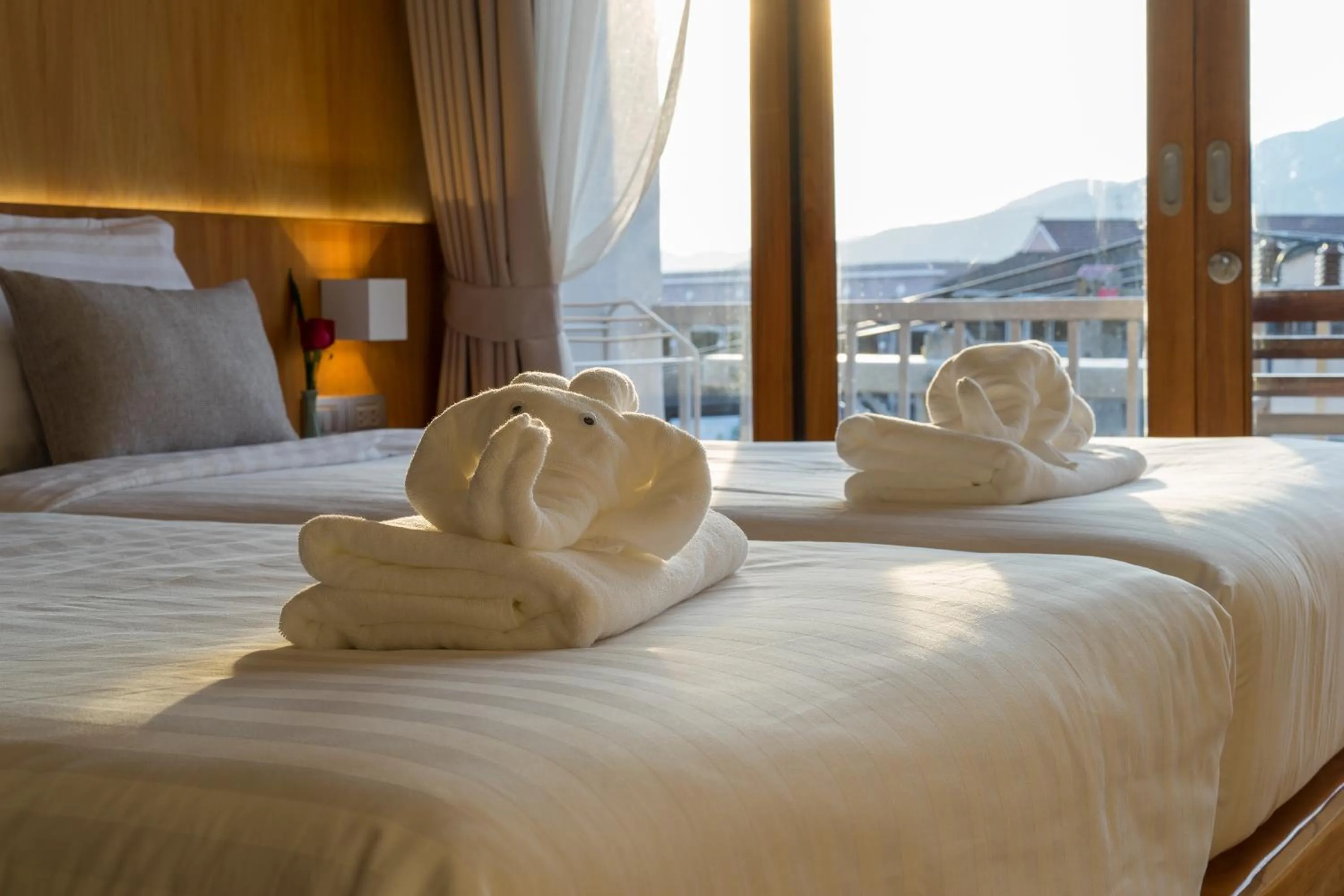 Bed in Nuan Boutique Hotel