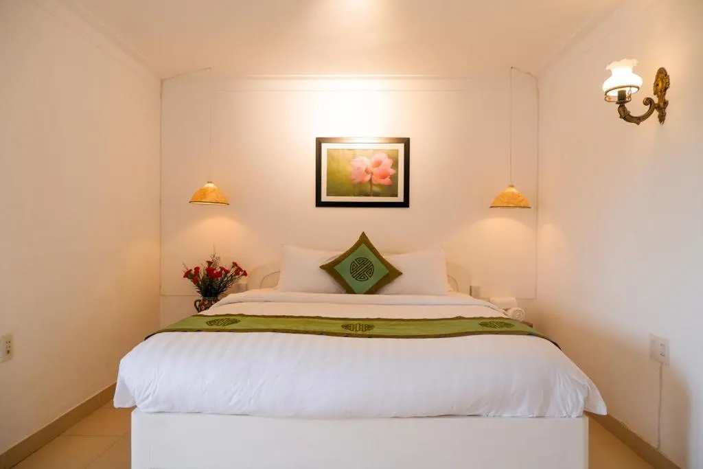 Bed in Purple Hue - Charming Riverside