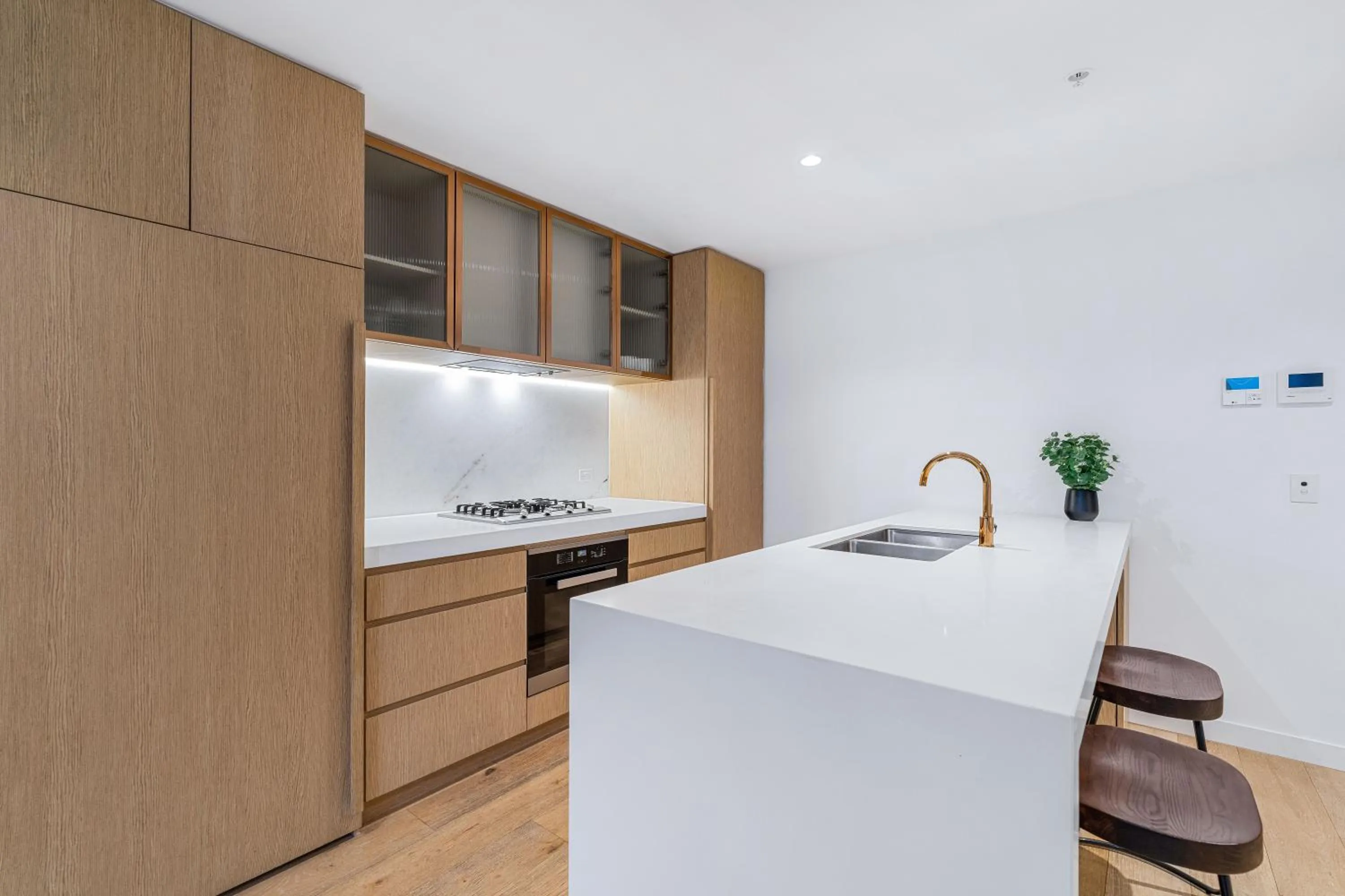 Kitchen or kitchenette in Collins House Apartments by CLLIX