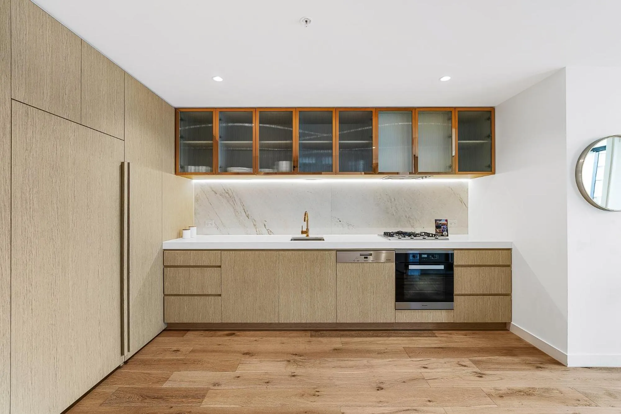 Kitchen or kitchenette in Collins House Apartments by CLLIX