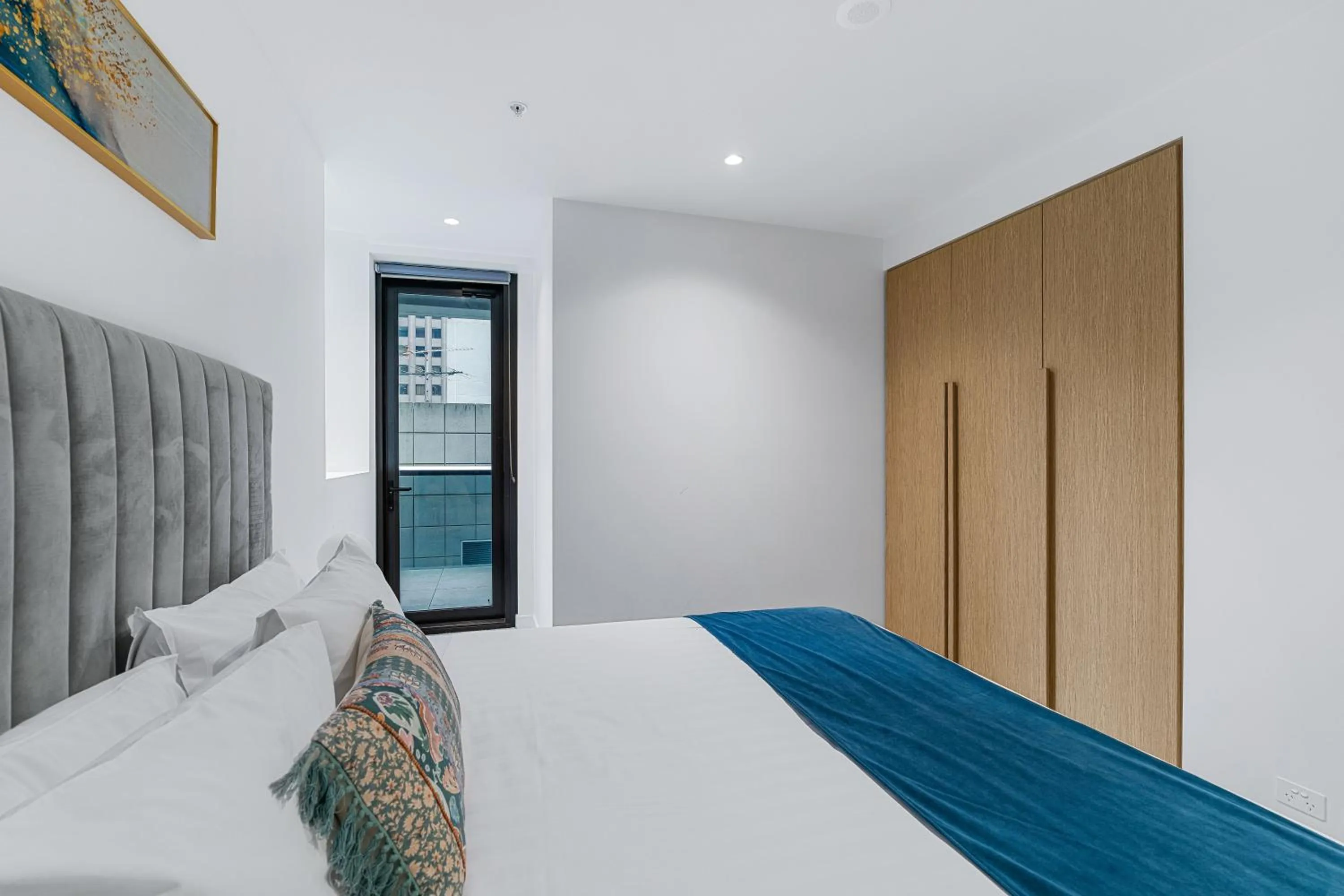 Bed in Collins House Apartments by CLLIX