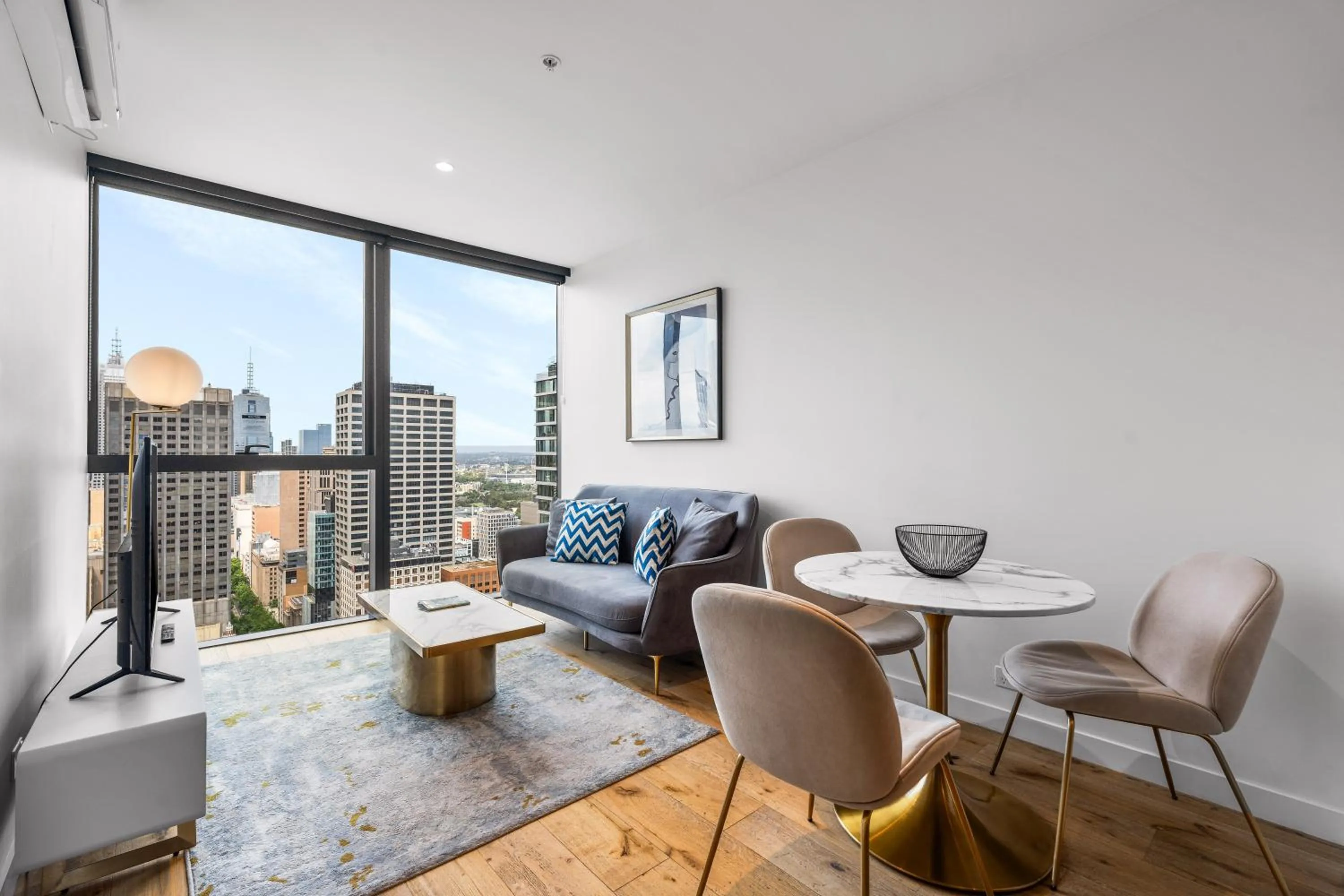 Living room in Collins House Apartments by CLLIX