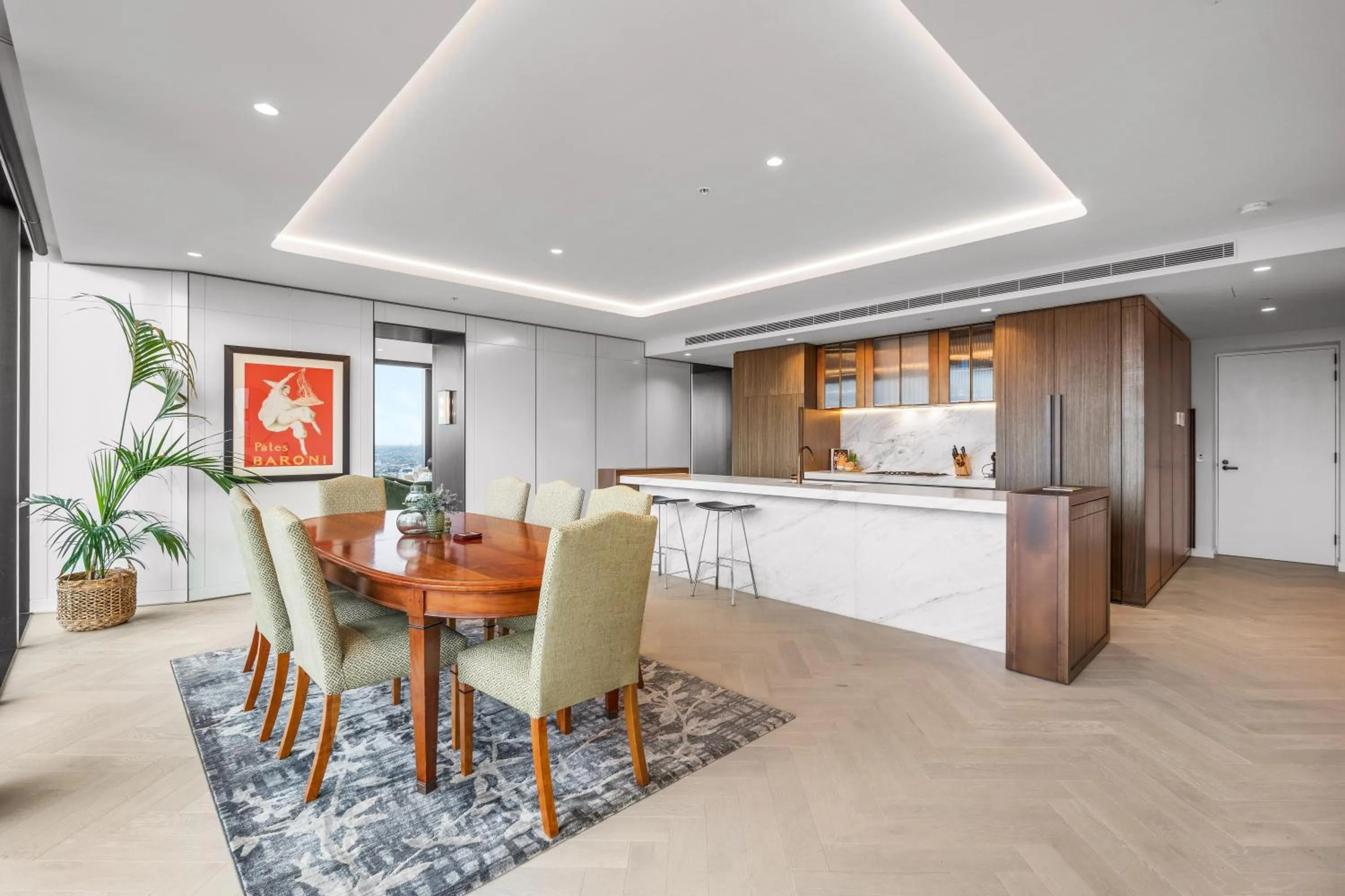 Dining area in Collins House Apartments by CLLIX