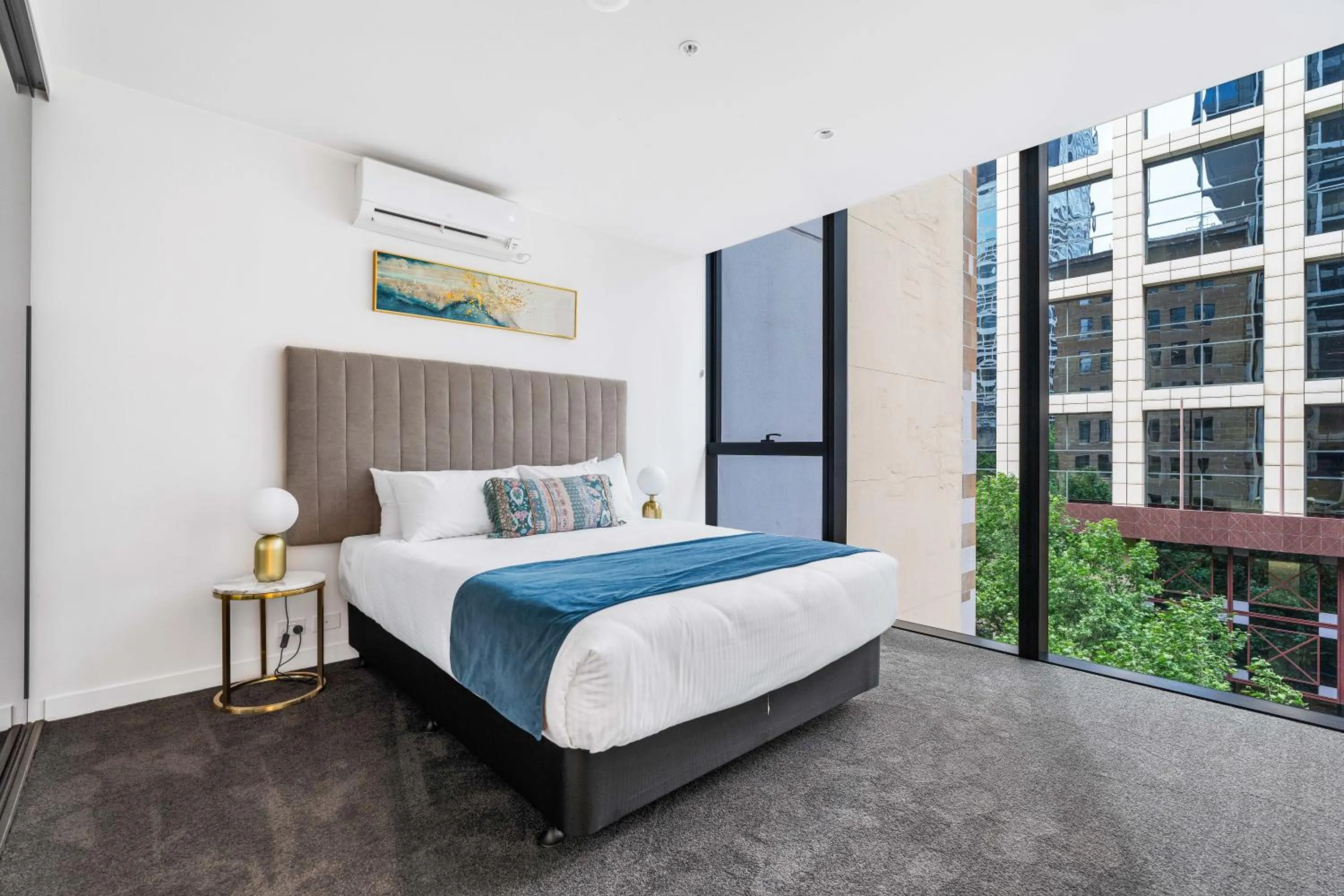 Bed in Collins House Apartments by CLLIX