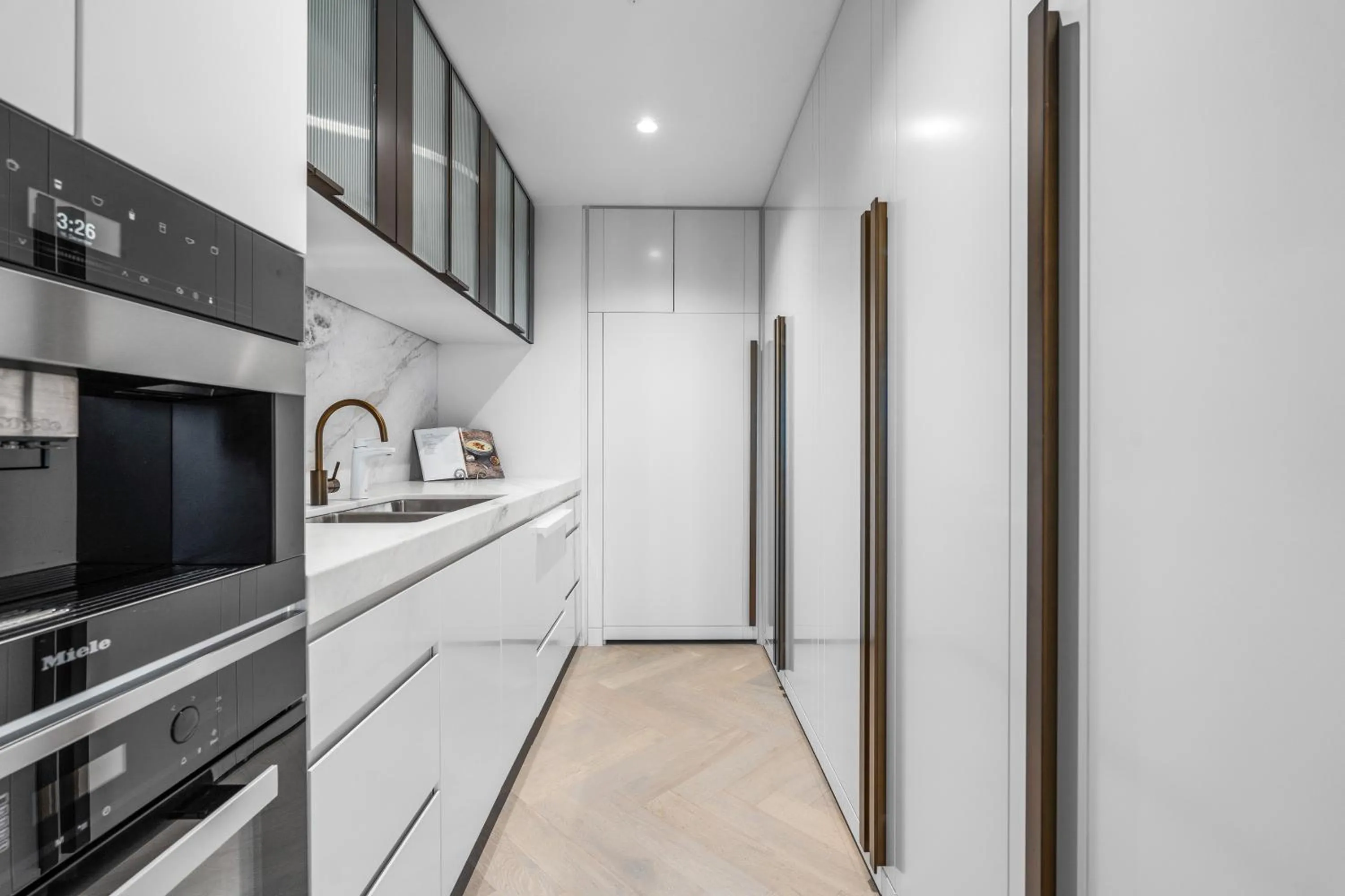 kitchen in Collins House Apartments by CLLIX