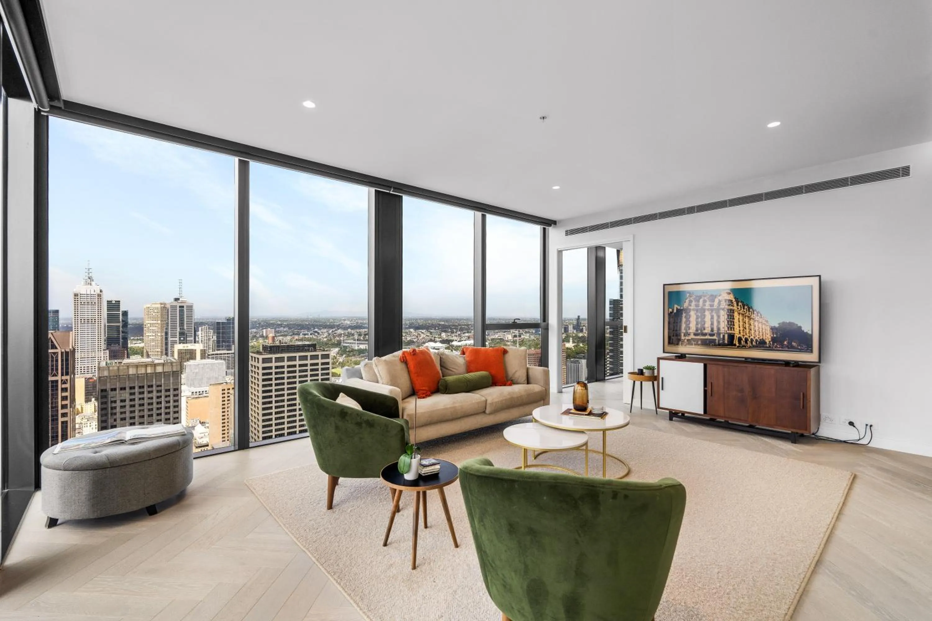 Living room in Collins House Apartments by CLLIX