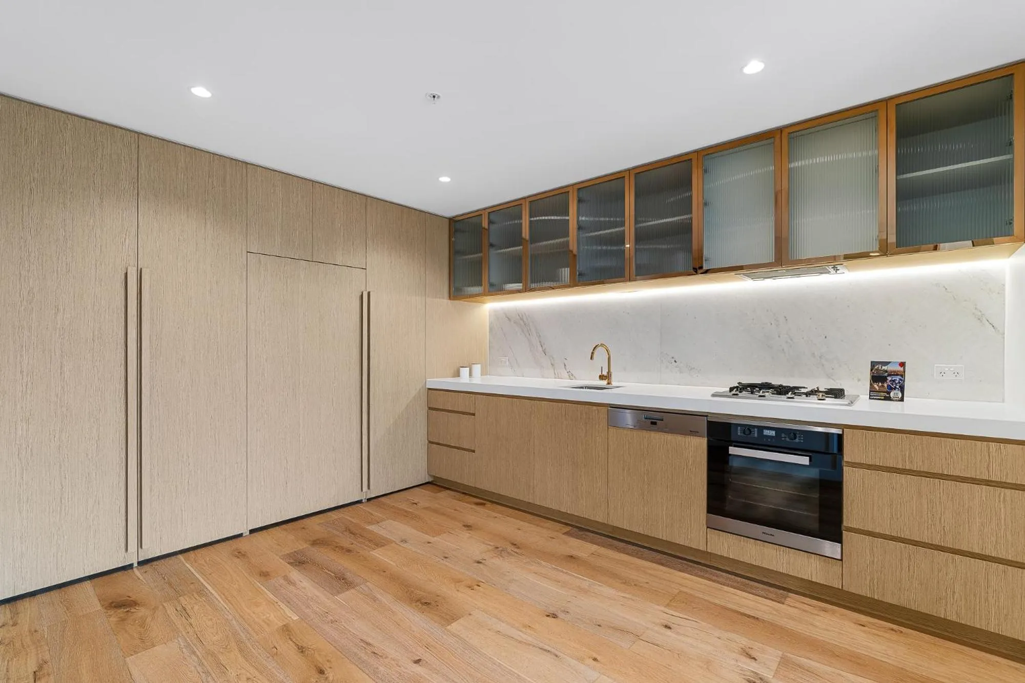 Kitchen or kitchenette in Collins House Apartments by CLLIX