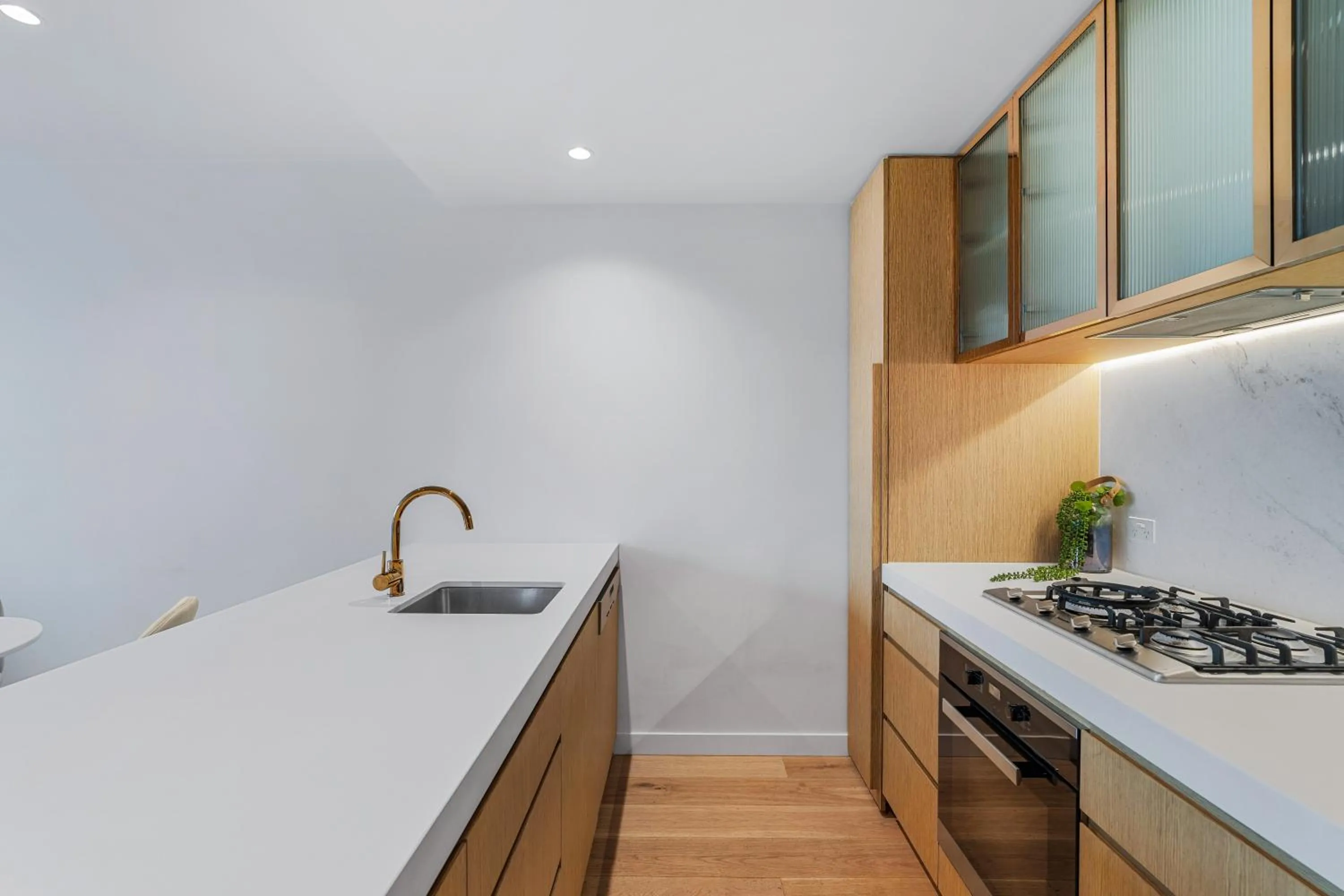 Kitchen or kitchenette in Collins House Apartments by CLLIX