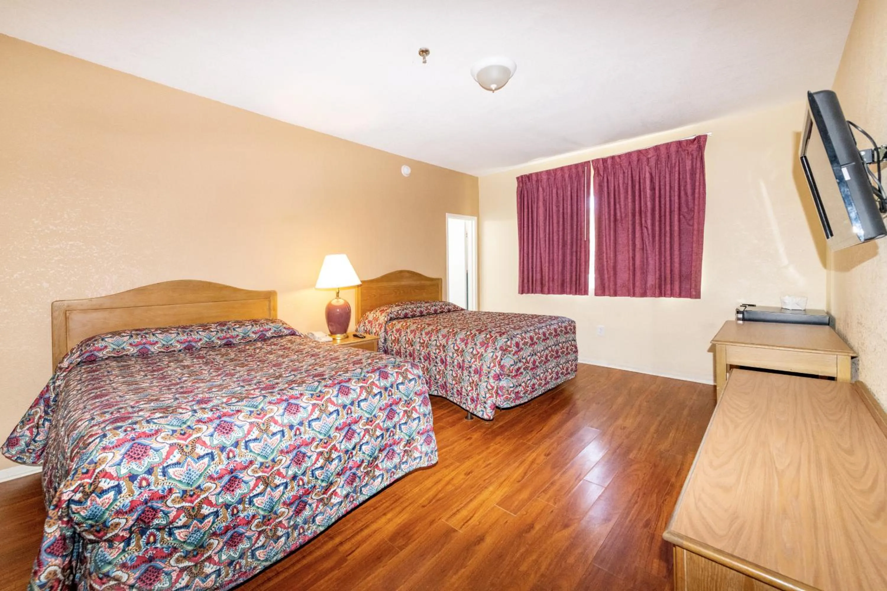 Bed in Ocean Beach Suites