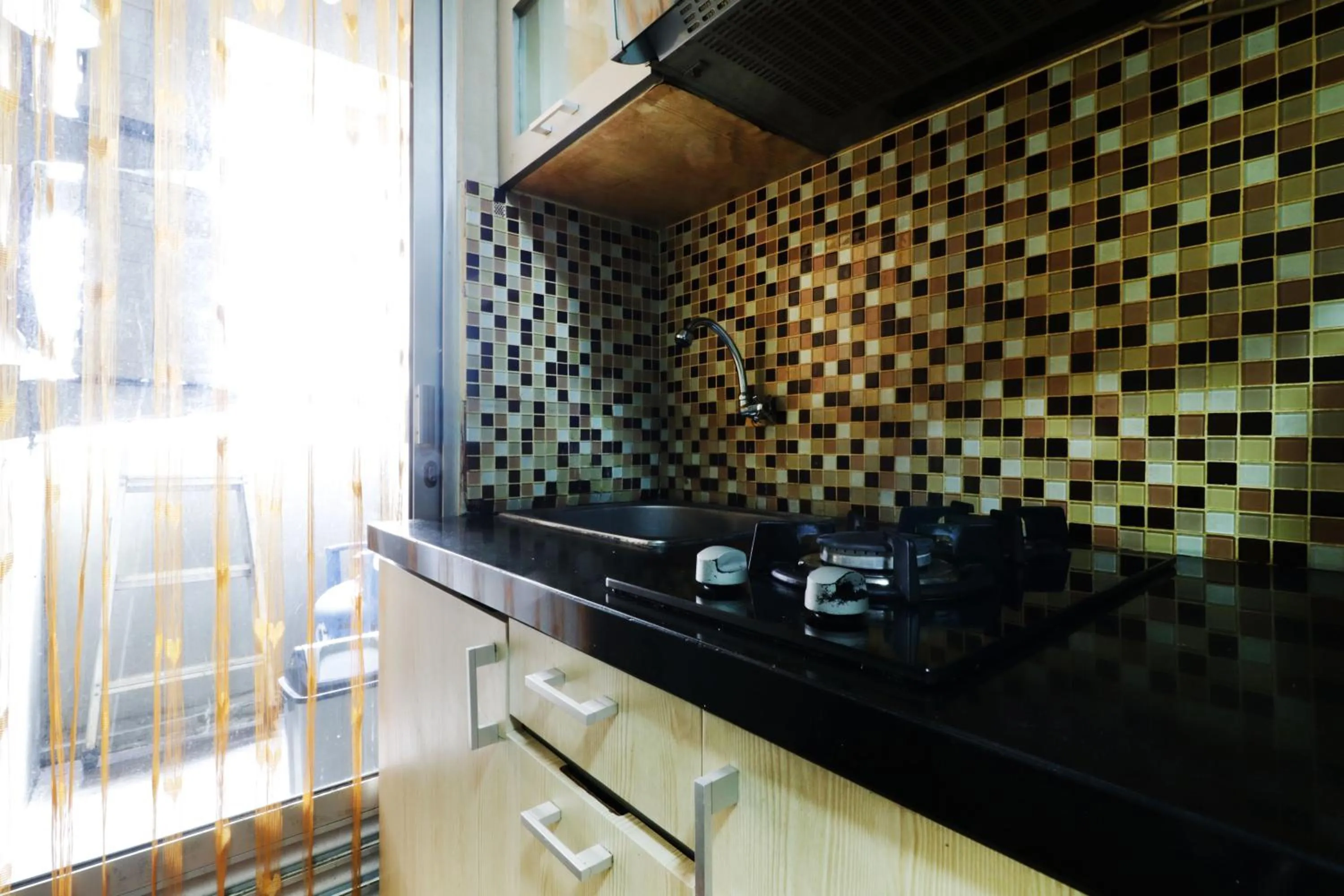 Kitchen or kitchenette in Apartment Kalibata City by Novi