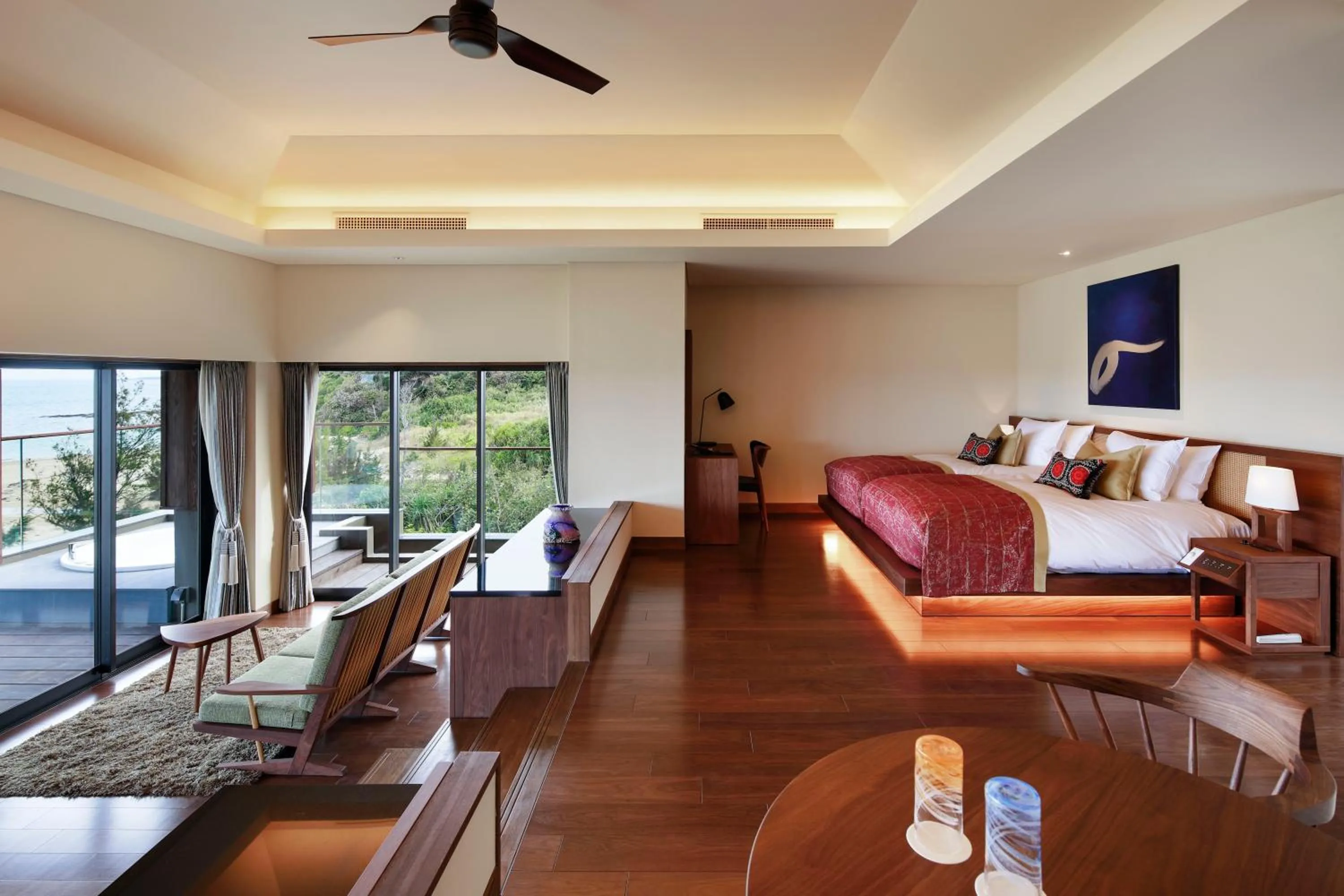 Living room, Bed in THE HIRAMATSU HOTELS & RESORTS GINOZA OKINAWA