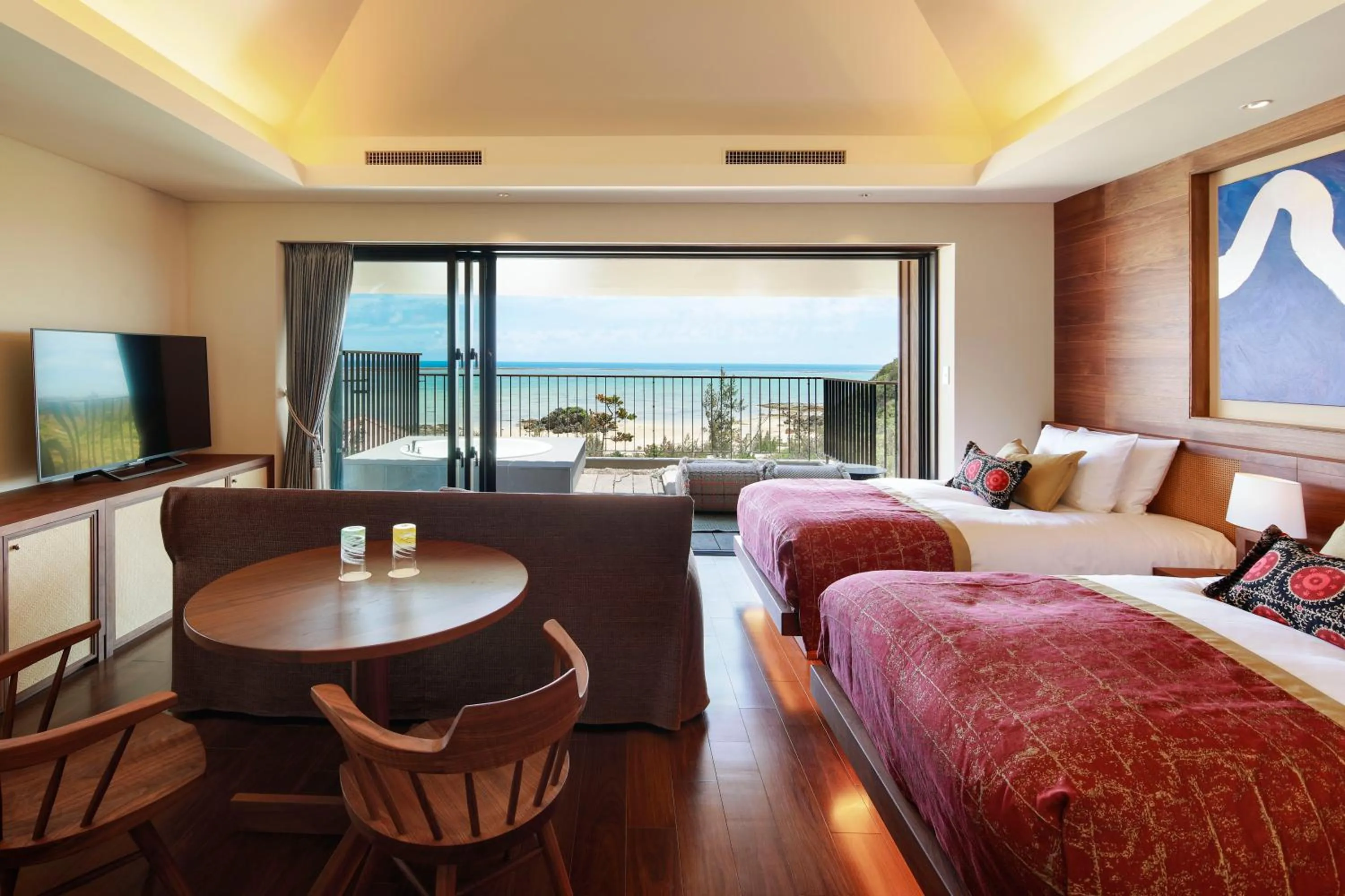 Living room, Bed in THE HIRAMATSU HOTELS & RESORTS GINOZA OKINAWA