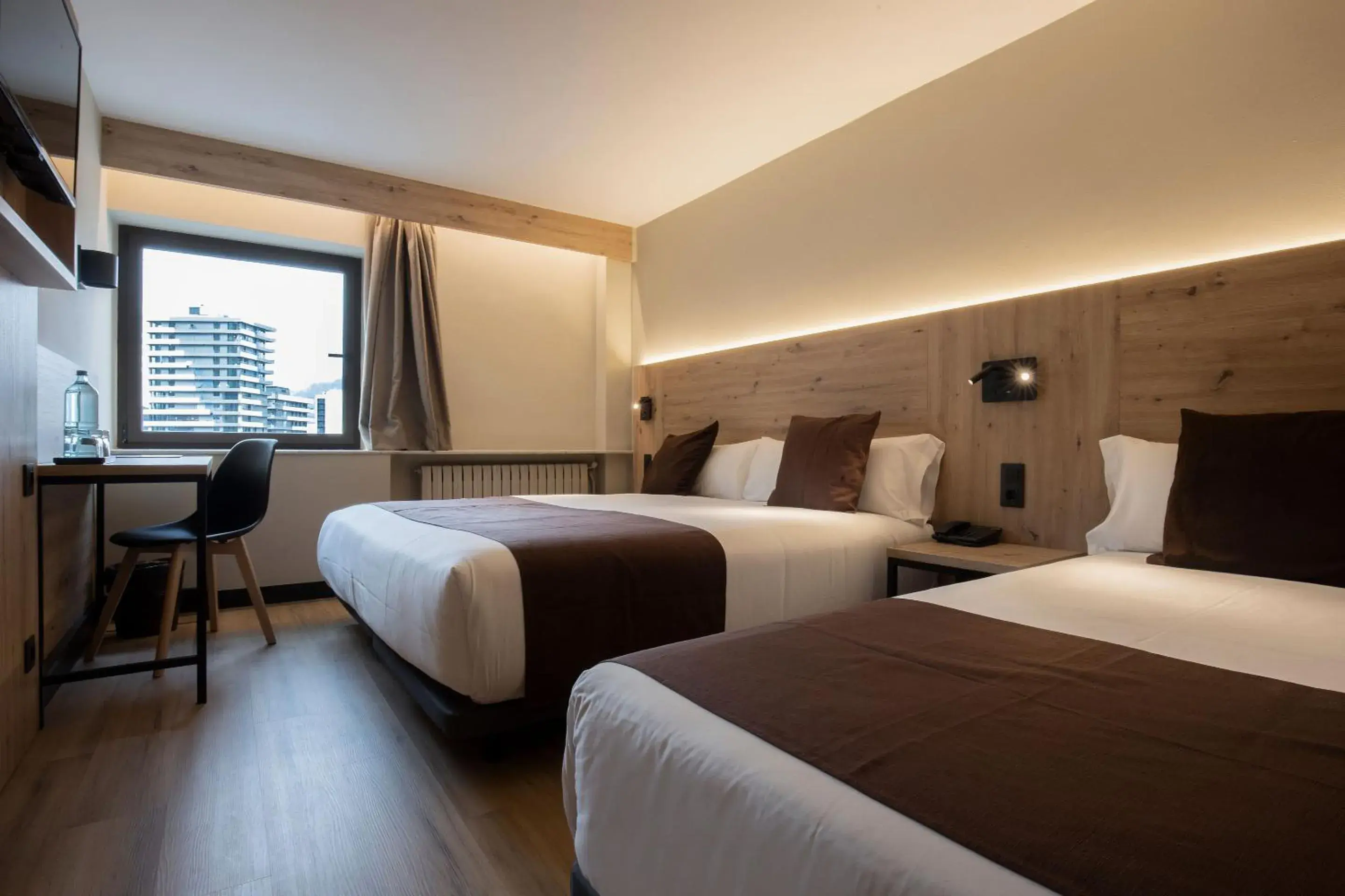 Triple Room in Hotel Comtes d'Urgell by Nexta Triple Room in Hotel Comtes d'Urgell by Nexta