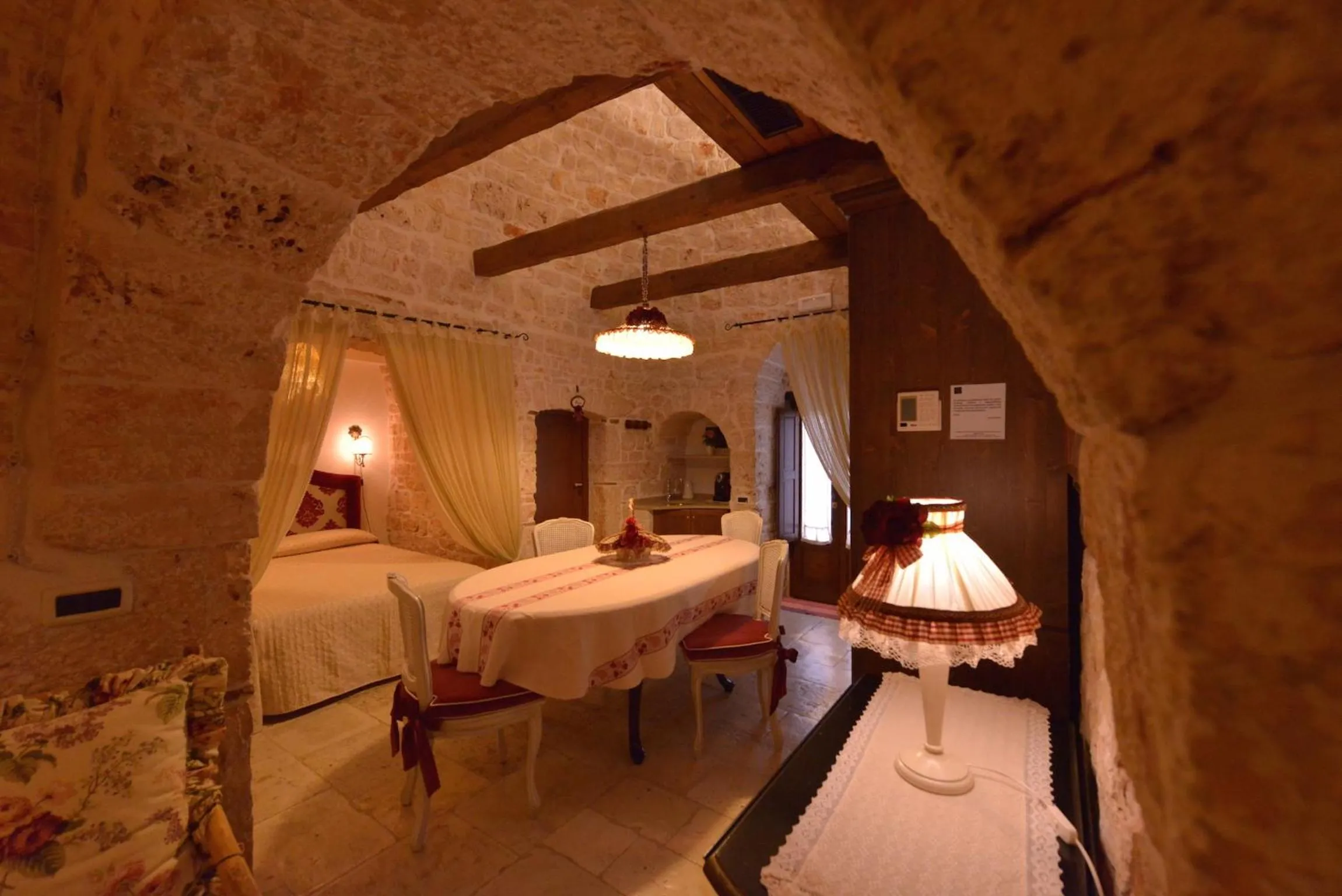 Dining area, Bed in Romantic Trulli