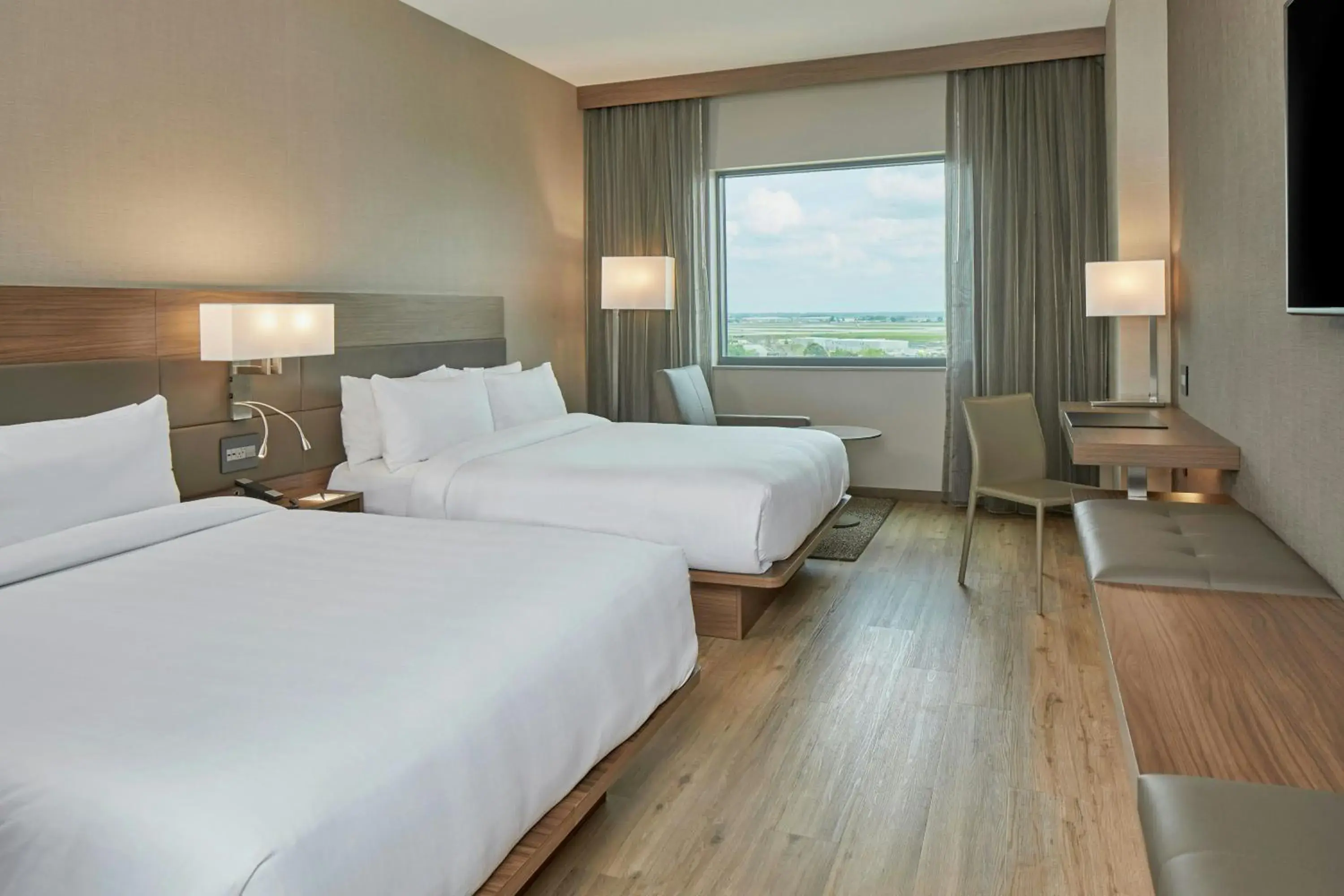 Guest room, 2 Queen, Airport view in AC Hotel by Marriott Atlanta Airport Gateway Guest room, 2 Queen, Airport view in AC Hotel by Marriott Atlanta Airport Gateway