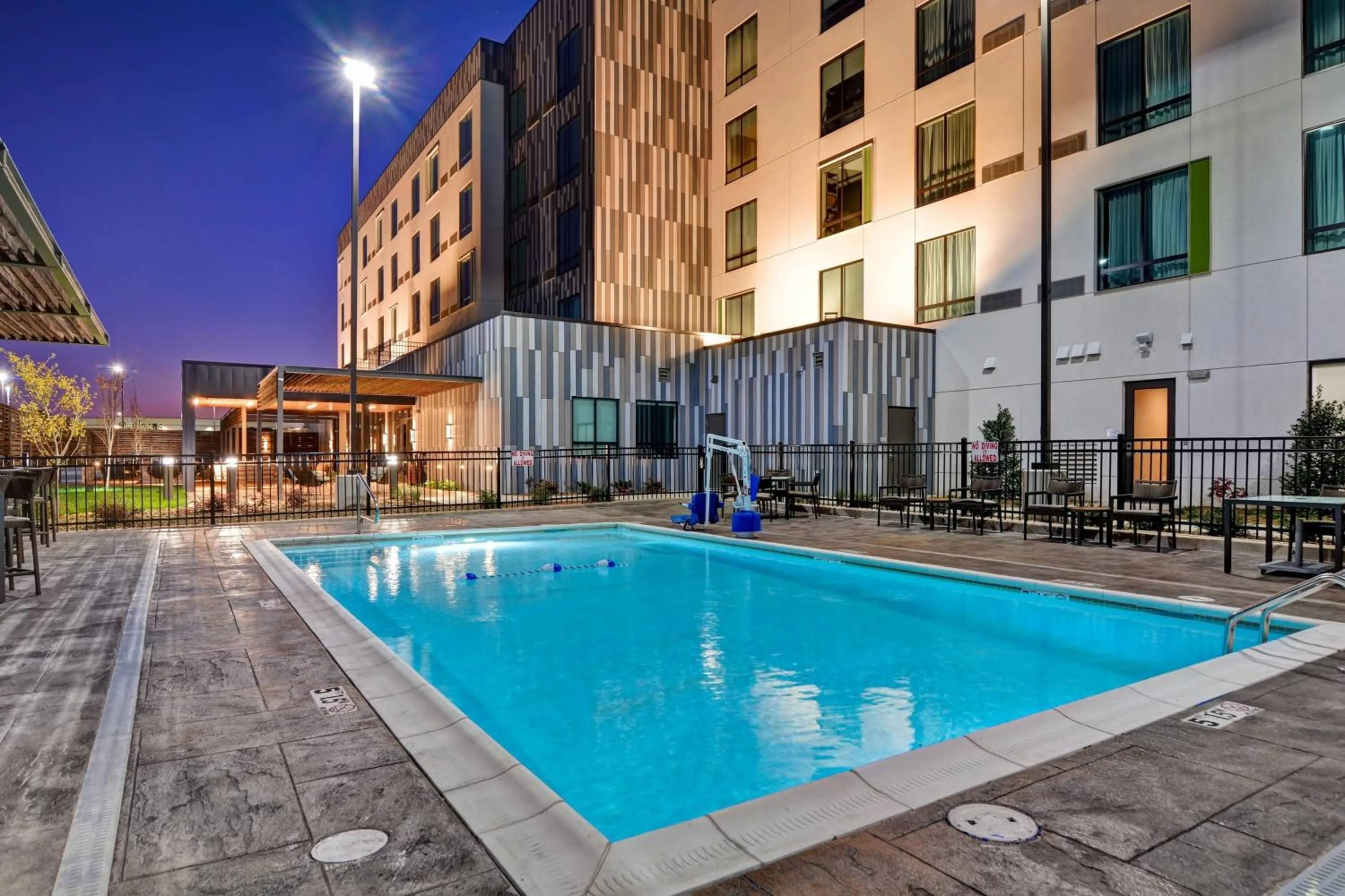 Swimming pool in Courtyard by Marriott Bentonville Rogers Promenade