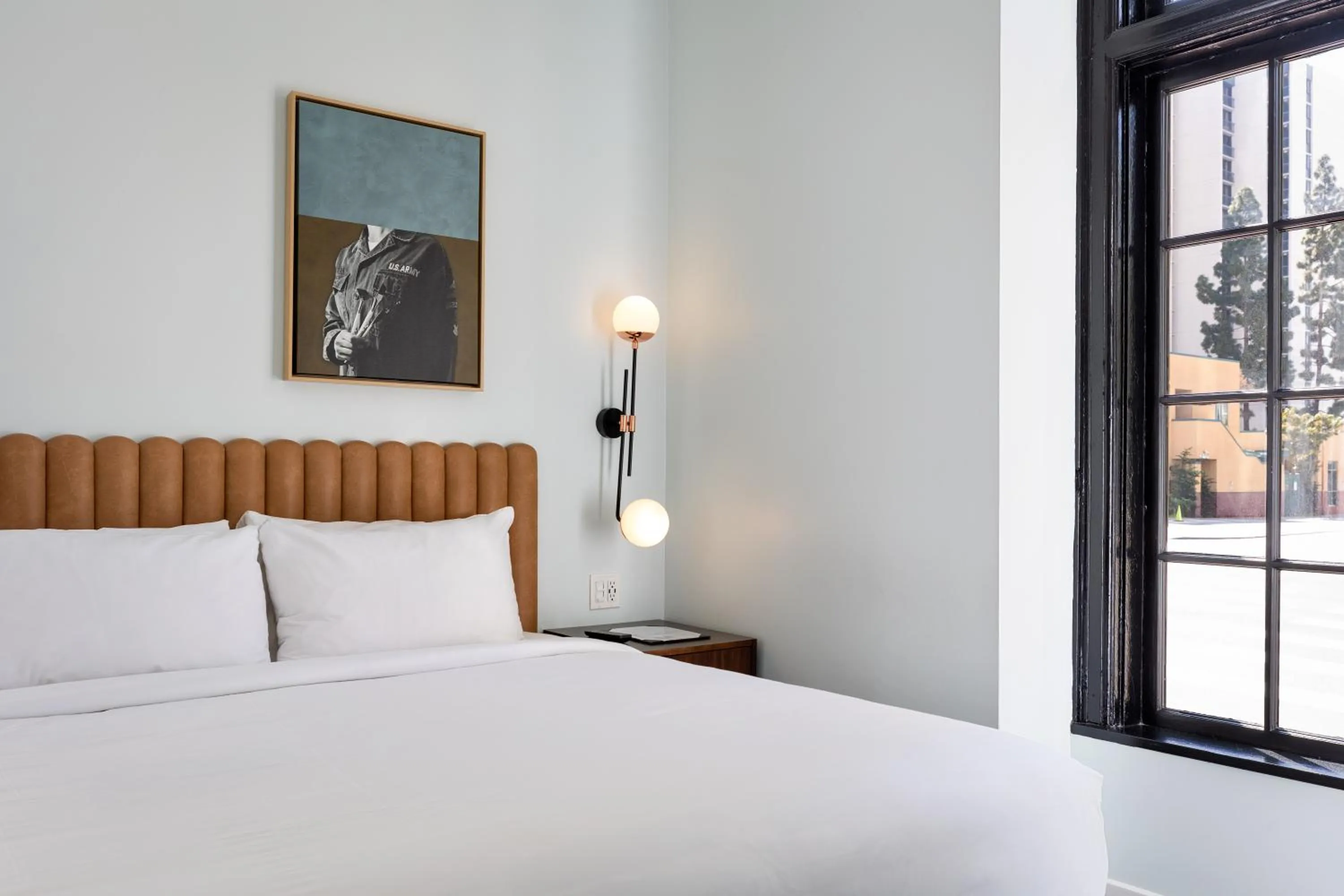 Bed in The Guild Hotel, San Diego Downtown, a Marriott Tribute Portfolio Hotel